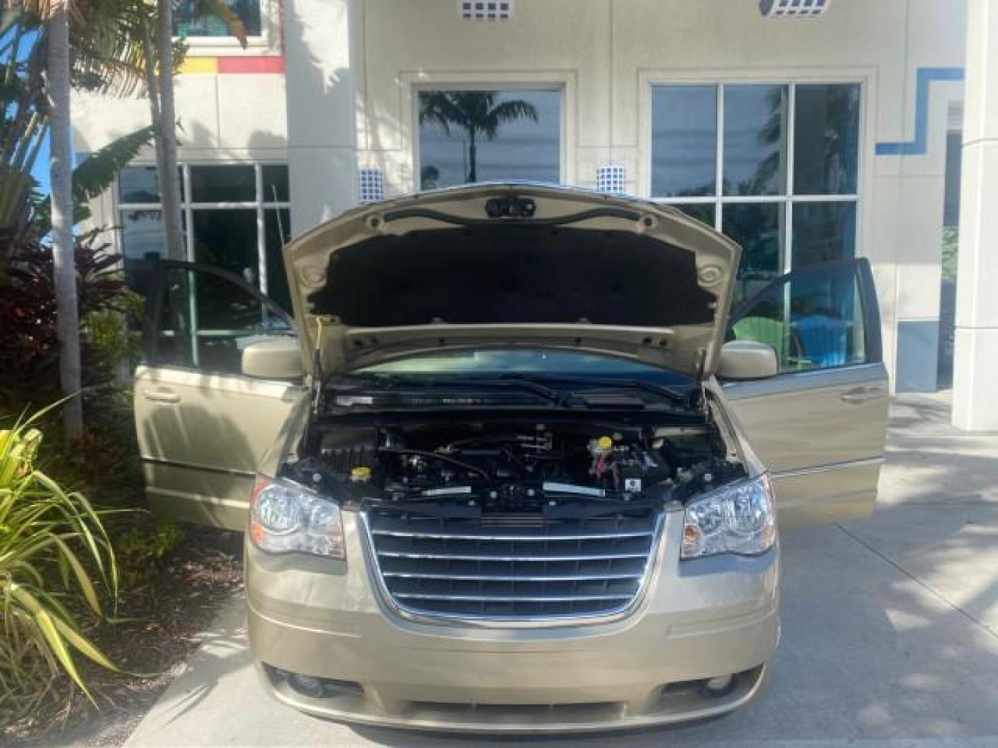 2010 White Gold /Medium pebble beige/cream Chrysler Town and Country Touring LOW MILES 33,692 1 OWNER (2A4RR5D1XAR) with an 3.8L OHV SMPI V6 Engine engine, Automatic transmission, located at 4701 North Dixie Hwy, Pompano Beach, FL, 33064, (954) 422-2889, 26.240938, -80.123474 - OUR WEBPAGE FLORIDACARS1.COM HAS OVER 100 PHOTOS AND FREE CARFAX LINK 2010 CHRYSLER TOWN AND COUNTRY TOURING VIN: 2A4RR5D1XAR392905 2 A 4 R R 5 D 1 X A R 3 9 2 9 0 5 VAN 3.8L V6 F OHV 12V GASOLINE 23 MPG FRONT WHEEL DRIVE Features ABS Brakes Air Conditioning Alloy Wheels AM/FM Stereo Automatic Trans - Photo#17