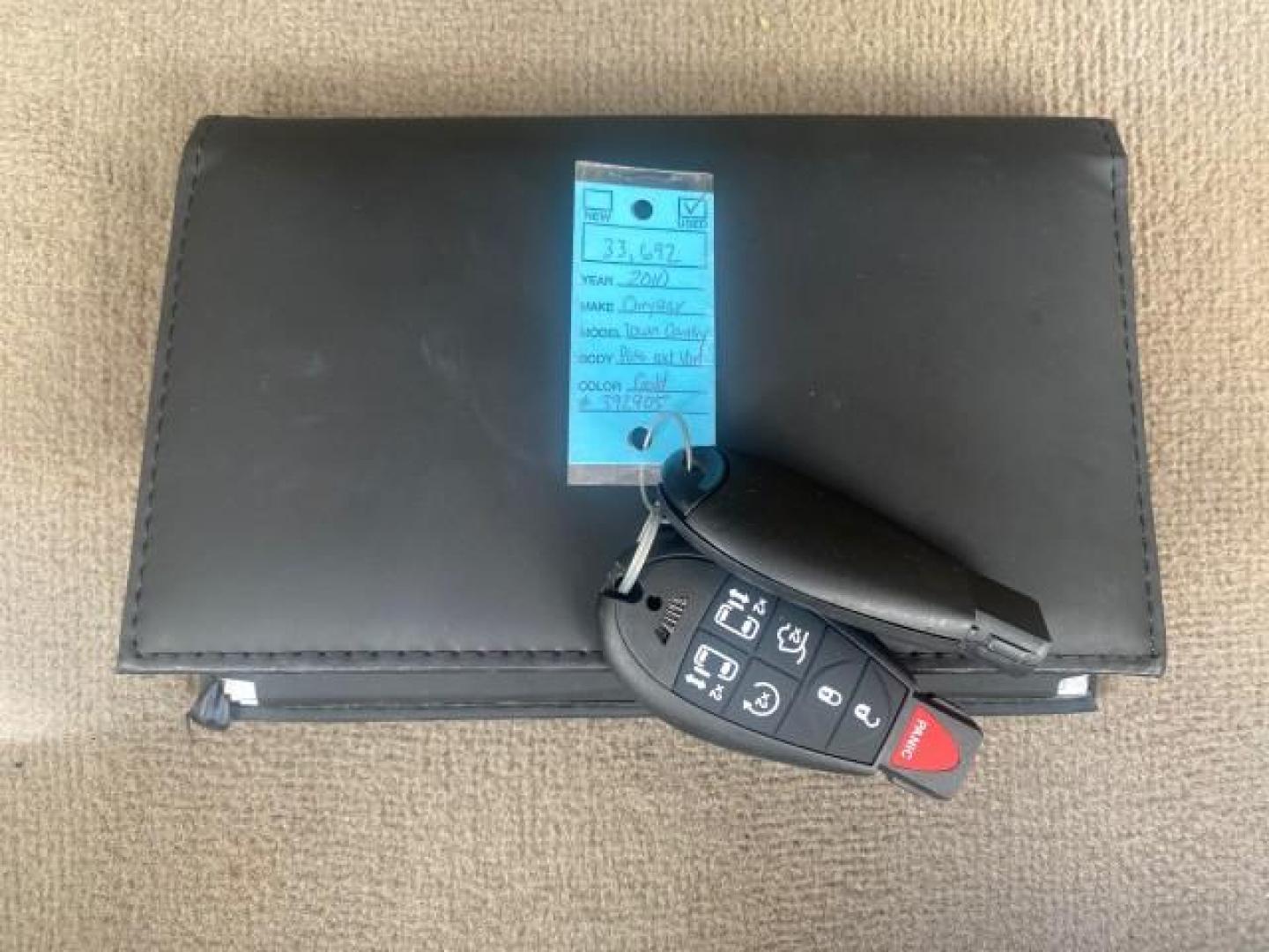 2010 White Gold /Medium pebble beige/cream Chrysler Town and Country Touring LOW MILES 33,692 1 OWNER (2A4RR5D1XAR) with an 3.8L OHV SMPI V6 Engine engine, Automatic transmission, located at 4701 North Dixie Hwy, Pompano Beach, FL, 33064, (954) 422-2889, 26.240938, -80.123474 - OUR WEBPAGE FLORIDACARS1.COM HAS OVER 100 PHOTOS AND FREE CARFAX LINK 2010 CHRYSLER TOWN AND COUNTRY TOURING VIN: 2A4RR5D1XAR392905 2 A 4 R R 5 D 1 X A R 3 9 2 9 0 5 VAN 3.8L V6 F OHV 12V GASOLINE 23 MPG FRONT WHEEL DRIVE Features ABS Brakes Air Conditioning Alloy Wheels AM/FM Stereo Automatic Trans - Photo#23