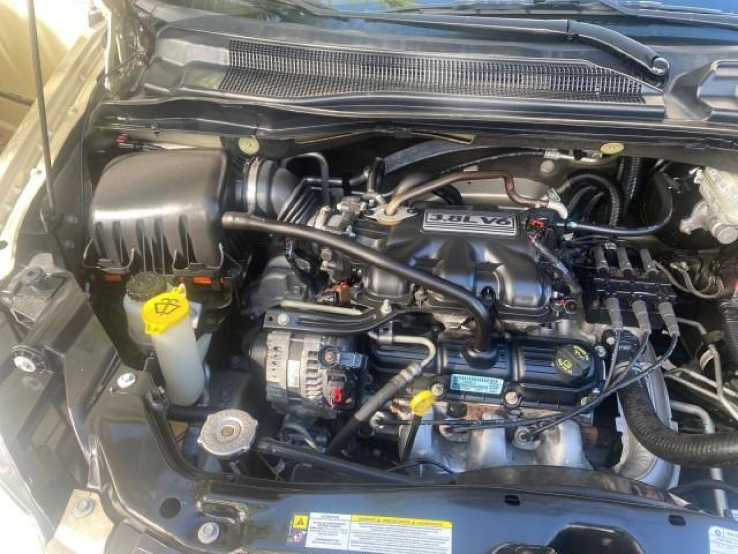 2010 White Gold /Medium pebble beige/cream Chrysler Town and Country Touring LOW MILES 33,692 1 OWNER (2A4RR5D1XAR) with an 3.8L OHV SMPI V6 Engine engine, Automatic transmission, located at 4701 North Dixie Hwy, Pompano Beach, FL, 33064, (954) 422-2889, 26.240938, -80.123474 - OUR WEBPAGE FLORIDACARS1.COM HAS OVER 100 PHOTOS AND FREE CARFAX LINK 2010 CHRYSLER TOWN AND COUNTRY TOURING VIN: 2A4RR5D1XAR392905 2 A 4 R R 5 D 1 X A R 3 9 2 9 0 5 VAN 3.8L V6 F OHV 12V GASOLINE 23 MPG FRONT WHEEL DRIVE Features ABS Brakes Air Conditioning Alloy Wheels AM/FM Stereo Automatic Trans - Photo#25