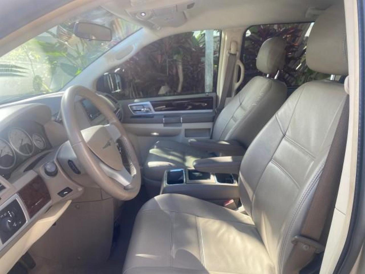 2010 White Gold /Medium pebble beige/cream Chrysler Town and Country Touring LOW MILES 33,692 1 OWNER (2A4RR5D1XAR) with an 3.8L OHV SMPI V6 Engine engine, Automatic transmission, located at 4701 North Dixie Hwy, Pompano Beach, FL, 33064, (954) 422-2889, 26.240938, -80.123474 - OUR WEBPAGE FLORIDACARS1.COM HAS OVER 100 PHOTOS AND FREE CARFAX LINK 2010 CHRYSLER TOWN AND COUNTRY TOURING VIN: 2A4RR5D1XAR392905 2 A 4 R R 5 D 1 X A R 3 9 2 9 0 5 VAN 3.8L V6 F OHV 12V GASOLINE 23 MPG FRONT WHEEL DRIVE Features ABS Brakes Air Conditioning Alloy Wheels AM/FM Stereo Automatic Trans - Photo#44