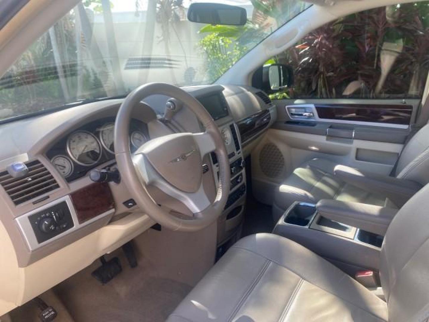 2010 White Gold /Medium pebble beige/cream Chrysler Town and Country Touring LOW MILES 33,692 1 OWNER (2A4RR5D1XAR) with an 3.8L OHV SMPI V6 Engine engine, Automatic transmission, located at 4701 North Dixie Hwy, Pompano Beach, FL, 33064, (954) 422-2889, 26.240938, -80.123474 - OUR WEBPAGE FLORIDACARS1.COM HAS OVER 100 PHOTOS AND FREE CARFAX LINK 2010 CHRYSLER TOWN AND COUNTRY TOURING VIN: 2A4RR5D1XAR392905 2 A 4 R R 5 D 1 X A R 3 9 2 9 0 5 VAN 3.8L V6 F OHV 12V GASOLINE 23 MPG FRONT WHEEL DRIVE Features ABS Brakes Air Conditioning Alloy Wheels AM/FM Stereo Automatic Trans - Photo#46