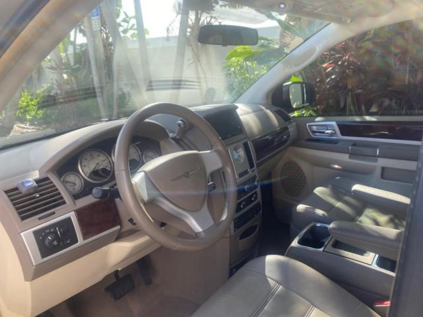 2010 White Gold /Medium pebble beige/cream Chrysler Town and Country Touring LOW MILES 33,692 1 OWNER (2A4RR5D1XAR) with an 3.8L OHV SMPI V6 Engine engine, Automatic transmission, located at 4701 North Dixie Hwy, Pompano Beach, FL, 33064, (954) 422-2889, 26.240938, -80.123474 - OUR WEBPAGE FLORIDACARS1.COM HAS OVER 100 PHOTOS AND FREE CARFAX LINK 2010 CHRYSLER TOWN AND COUNTRY TOURING VIN: 2A4RR5D1XAR392905 2 A 4 R R 5 D 1 X A R 3 9 2 9 0 5 VAN 3.8L V6 F OHV 12V GASOLINE 23 MPG FRONT WHEEL DRIVE Features ABS Brakes Air Conditioning Alloy Wheels AM/FM Stereo Automatic Trans - Photo#47