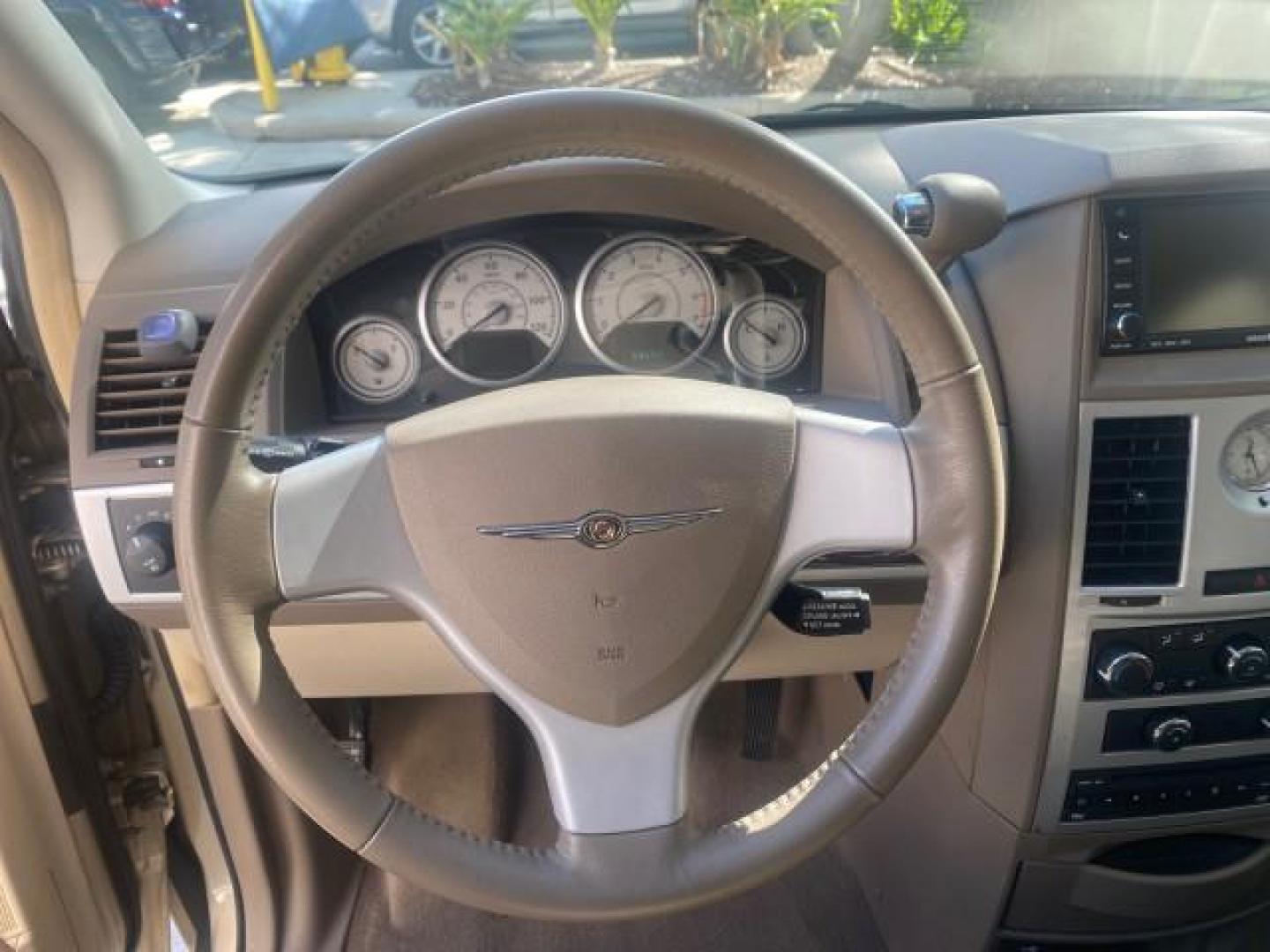 2010 White Gold /Medium pebble beige/cream Chrysler Town and Country Touring LOW MILES 33,692 1 OWNER (2A4RR5D1XAR) with an 3.8L OHV SMPI V6 Engine engine, Automatic transmission, located at 4701 North Dixie Hwy, Pompano Beach, FL, 33064, (954) 422-2889, 26.240938, -80.123474 - OUR WEBPAGE FLORIDACARS1.COM HAS OVER 100 PHOTOS AND FREE CARFAX LINK 2010 CHRYSLER TOWN AND COUNTRY TOURING VIN: 2A4RR5D1XAR392905 2 A 4 R R 5 D 1 X A R 3 9 2 9 0 5 VAN 3.8L V6 F OHV 12V GASOLINE 23 MPG FRONT WHEEL DRIVE Features ABS Brakes Air Conditioning Alloy Wheels AM/FM Stereo Automatic Trans - Photo#48