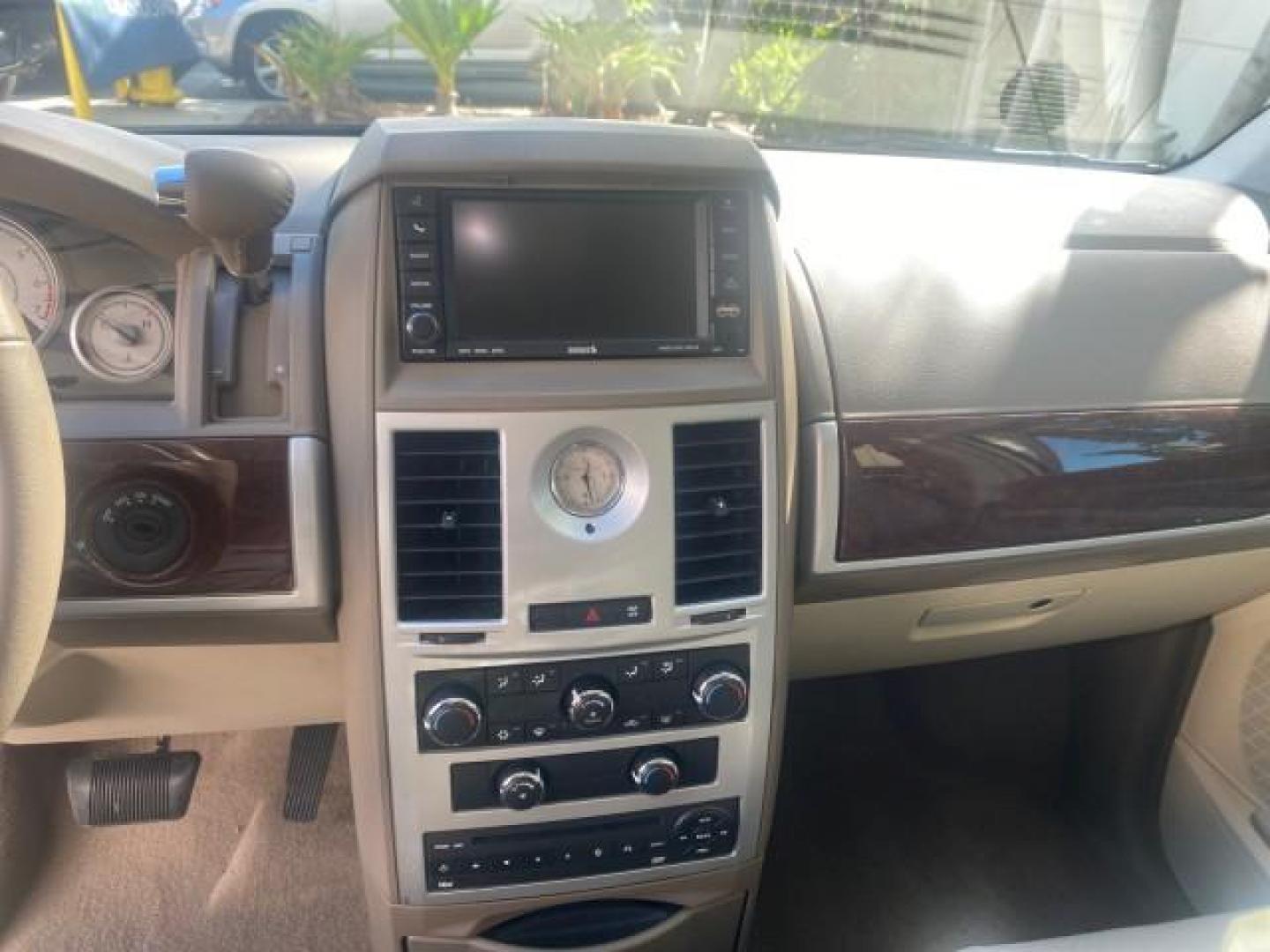 2010 White Gold /Medium pebble beige/cream Chrysler Town and Country Touring LOW MILES 33,692 1 OWNER (2A4RR5D1XAR) with an 3.8L OHV SMPI V6 Engine engine, Automatic transmission, located at 4701 North Dixie Hwy, Pompano Beach, FL, 33064, (954) 422-2889, 26.240938, -80.123474 - OUR WEBPAGE FLORIDACARS1.COM HAS OVER 100 PHOTOS AND FREE CARFAX LINK 2010 CHRYSLER TOWN AND COUNTRY TOURING VIN: 2A4RR5D1XAR392905 2 A 4 R R 5 D 1 X A R 3 9 2 9 0 5 VAN 3.8L V6 F OHV 12V GASOLINE 23 MPG FRONT WHEEL DRIVE Features ABS Brakes Air Conditioning Alloy Wheels AM/FM Stereo Automatic Trans - Photo#55