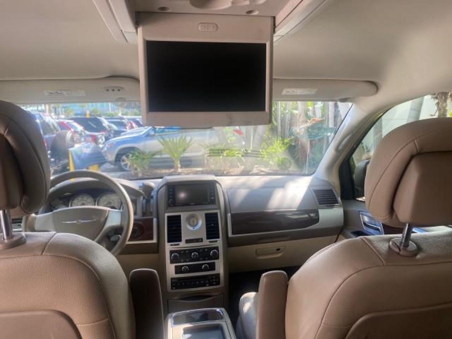 2010 White Gold /Medium pebble beige/cream Chrysler Town and Country Touring LOW MILES 33,692 1 OWNER (2A4RR5D1XAR) with an 3.8L OHV SMPI V6 Engine engine, Automatic transmission, located at 4701 North Dixie Hwy, Pompano Beach, FL, 33064, (954) 422-2889, 26.240938, -80.123474 - OUR WEBPAGE FLORIDACARS1.COM HAS OVER 100 PHOTOS AND FREE CARFAX LINK 2010 CHRYSLER TOWN AND COUNTRY TOURING VIN: 2A4RR5D1XAR392905 2 A 4 R R 5 D 1 X A R 3 9 2 9 0 5 VAN 3.8L V6 F OHV 12V GASOLINE 23 MPG FRONT WHEEL DRIVE Features ABS Brakes Air Conditioning Alloy Wheels AM/FM Stereo Automatic Trans - Photo#77