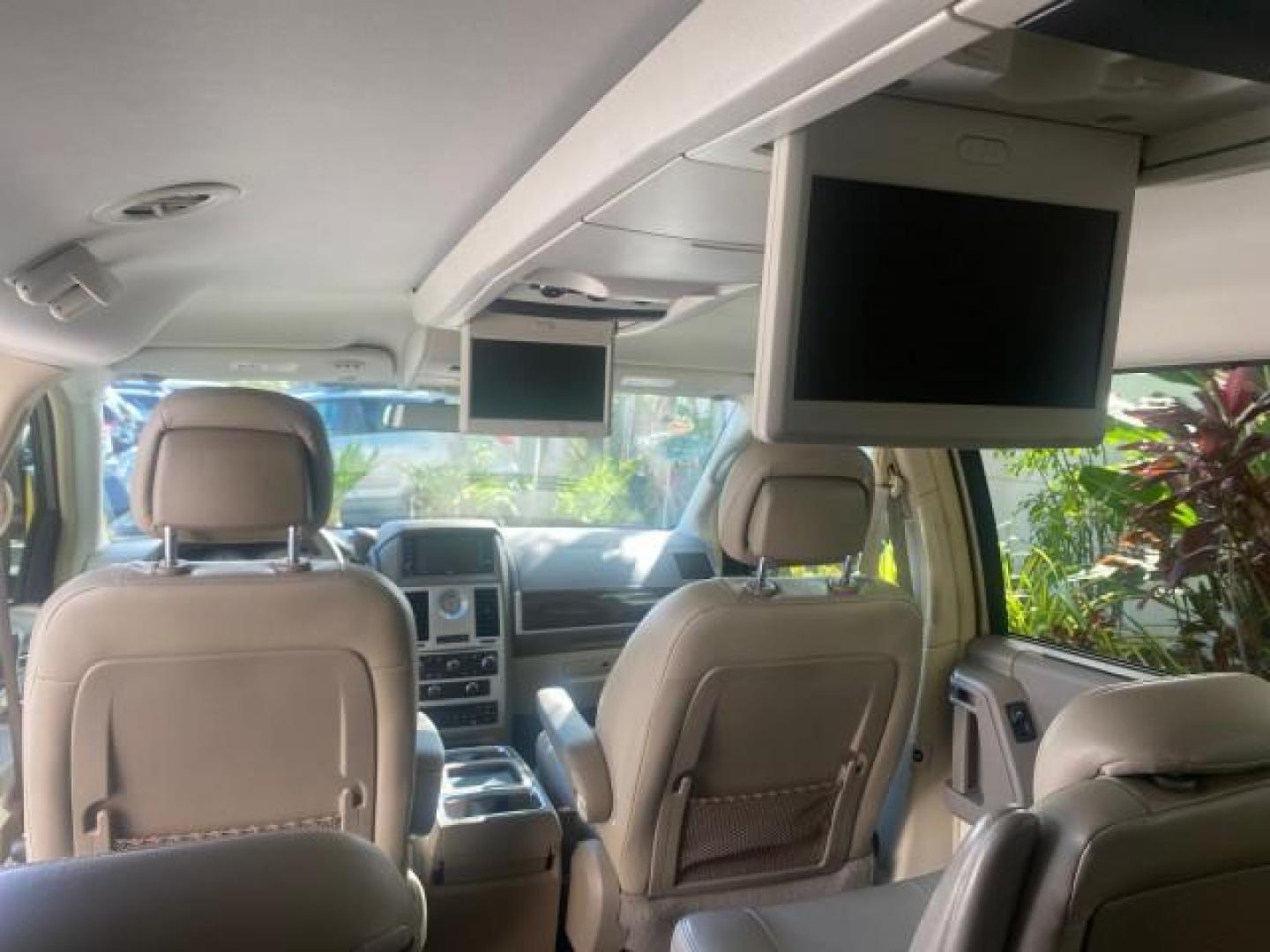 2010 White Gold /Medium pebble beige/cream Chrysler Town and Country Touring LOW MILES 33,692 1 OWNER (2A4RR5D1XAR) with an 3.8L OHV SMPI V6 Engine engine, Automatic transmission, located at 4701 North Dixie Hwy, Pompano Beach, FL, 33064, (954) 422-2889, 26.240938, -80.123474 - OUR WEBPAGE FLORIDACARS1.COM HAS OVER 100 PHOTOS AND FREE CARFAX LINK 2010 CHRYSLER TOWN AND COUNTRY TOURING VIN: 2A4RR5D1XAR392905 2 A 4 R R 5 D 1 X A R 3 9 2 9 0 5 VAN 3.8L V6 F OHV 12V GASOLINE 23 MPG FRONT WHEEL DRIVE Features ABS Brakes Air Conditioning Alloy Wheels AM/FM Stereo Automatic Trans - Photo#83