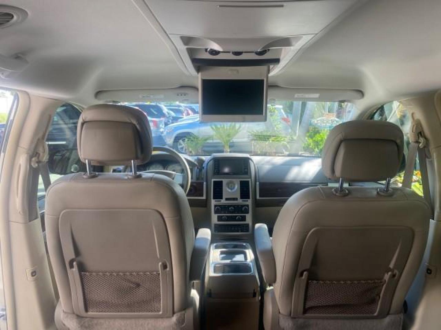 2010 White Gold /Medium pebble beige/cream Chrysler Town and Country Touring LOW MILES 33,692 1 OWNER (2A4RR5D1XAR) with an 3.8L OHV SMPI V6 Engine engine, Automatic transmission, located at 4701 North Dixie Hwy, Pompano Beach, FL, 33064, (954) 422-2889, 26.240938, -80.123474 - OUR WEBPAGE FLORIDACARS1.COM HAS OVER 100 PHOTOS AND FREE CARFAX LINK 2010 CHRYSLER TOWN AND COUNTRY TOURING VIN: 2A4RR5D1XAR392905 2 A 4 R R 5 D 1 X A R 3 9 2 9 0 5 VAN 3.8L V6 F OHV 12V GASOLINE 23 MPG FRONT WHEEL DRIVE Features ABS Brakes Air Conditioning Alloy Wheels AM/FM Stereo Automatic Trans - Photo#84