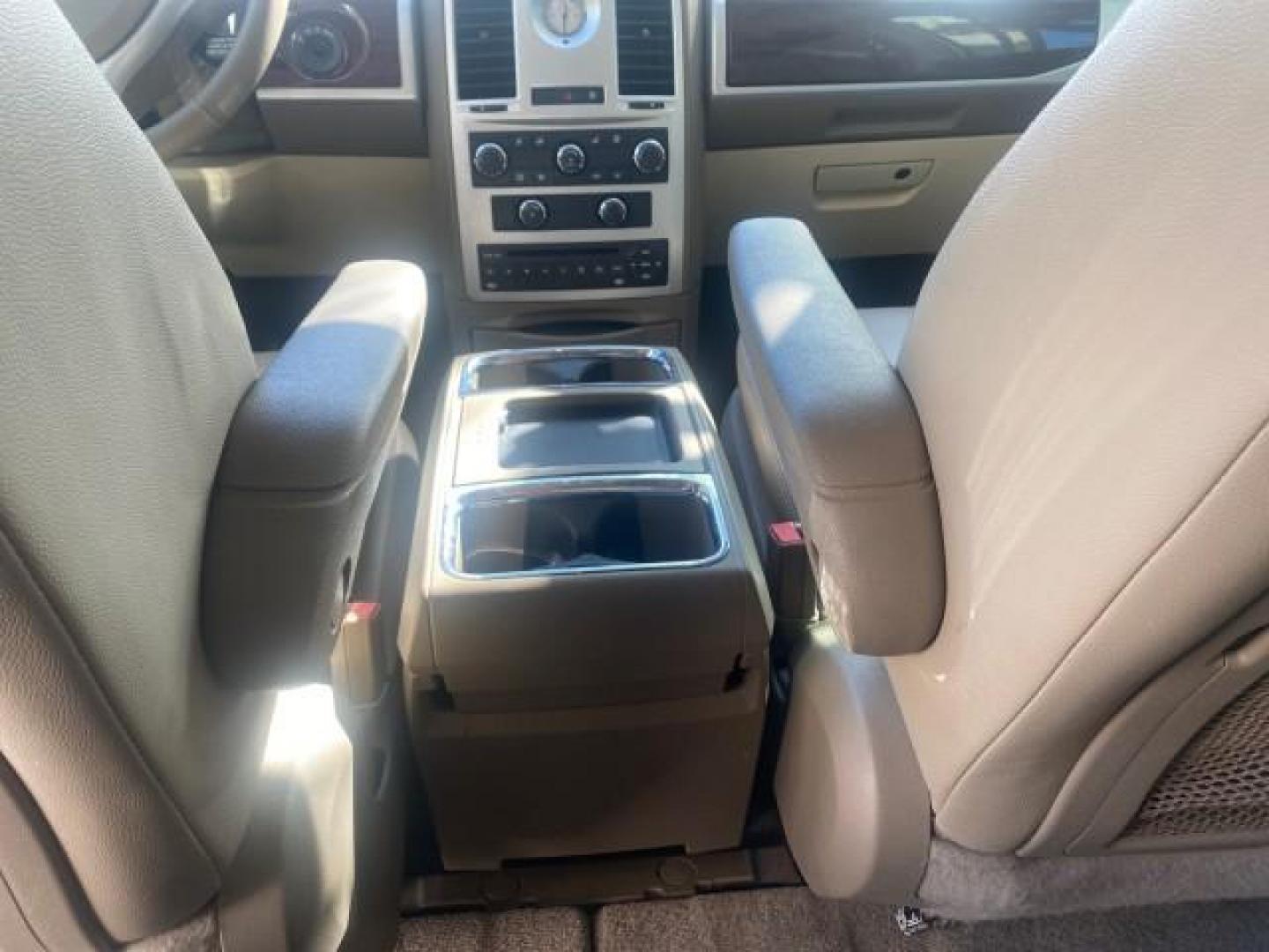 2010 White Gold /Medium pebble beige/cream Chrysler Town and Country Touring LOW MILES 33,692 1 OWNER (2A4RR5D1XAR) with an 3.8L OHV SMPI V6 Engine engine, Automatic transmission, located at 4701 North Dixie Hwy, Pompano Beach, FL, 33064, (954) 422-2889, 26.240938, -80.123474 - OUR WEBPAGE FLORIDACARS1.COM HAS OVER 100 PHOTOS AND FREE CARFAX LINK 2010 CHRYSLER TOWN AND COUNTRY TOURING VIN: 2A4RR5D1XAR392905 2 A 4 R R 5 D 1 X A R 3 9 2 9 0 5 VAN 3.8L V6 F OHV 12V GASOLINE 23 MPG FRONT WHEEL DRIVE Features ABS Brakes Air Conditioning Alloy Wheels AM/FM Stereo Automatic Trans - Photo#85