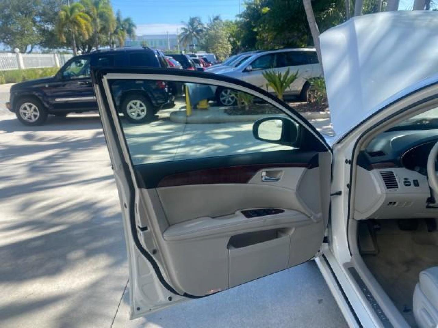2011 Blizzard Pearl /Light Gray Toyota Avalon LOW MILES 75,626 40 SERVICES (4T1BK3DB4BU) with an 3.5L DOHC EFI 24-Valve V6 Engine engine, Automatic transmission, located at 4701 North Dixie Hwy, Pompano Beach, FL, 33064, (954) 422-2889, 26.240938, -80.123474 - OUR WEBPAGE FLORIDACARS1.COM HAS OVER 100 PHOTOS AND FREE CARFAX LINK 2011 TOYOTA AVALON LIMITED VIN: 4T1BK3DB4BU383335 4 T 1 B K 3 D B 4 B U 3 8 3 3 3 5 SEDAN 4 DR 3.5L V6 F DOHC 24V GASOLINE 29 MPG FRONT WHEEL DRIVE Features ABS Brakes Air Conditioning Alloy Wheels AM/FM Stereo Automatic Transmiss - Photo#9