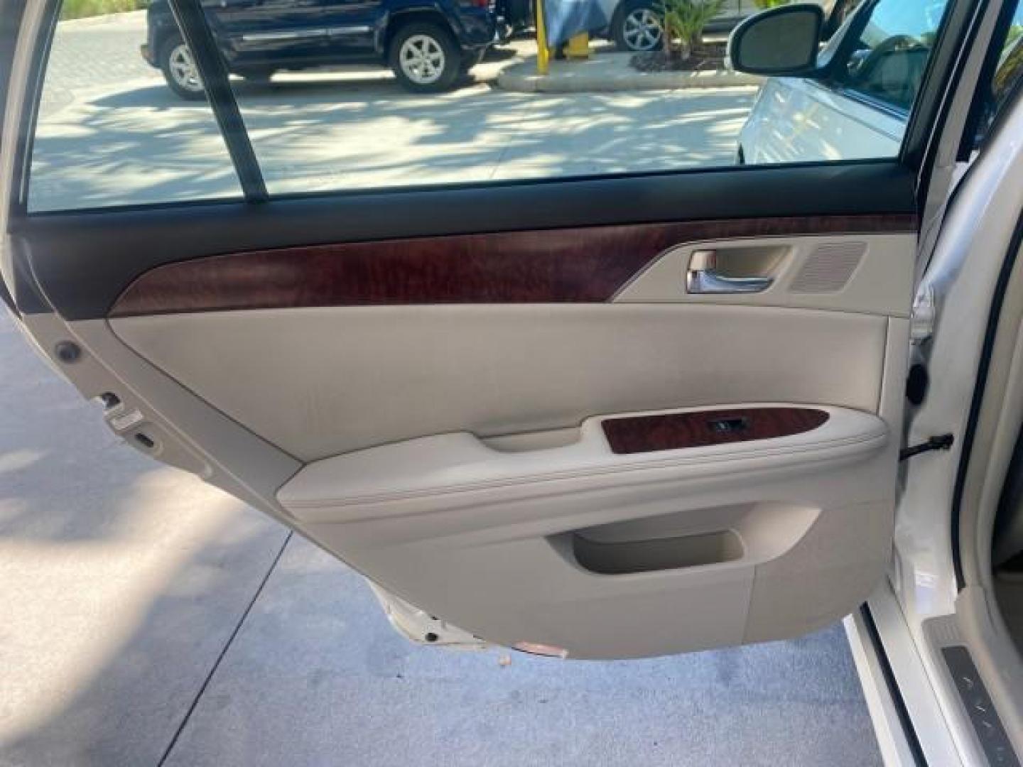 2011 Blizzard Pearl /Light Gray Toyota Avalon LOW MILES 75,626 40 SERVICES (4T1BK3DB4BU) with an 3.5L DOHC EFI 24-Valve V6 Engine engine, Automatic transmission, located at 4701 North Dixie Hwy, Pompano Beach, FL, 33064, (954) 422-2889, 26.240938, -80.123474 - OUR WEBPAGE FLORIDACARS1.COM HAS OVER 100 PHOTOS AND FREE CARFAX LINK 2011 TOYOTA AVALON LIMITED VIN: 4T1BK3DB4BU383335 4 T 1 B K 3 D B 4 B U 3 8 3 3 3 5 SEDAN 4 DR 3.5L V6 F DOHC 24V GASOLINE 29 MPG FRONT WHEEL DRIVE Features ABS Brakes Air Conditioning Alloy Wheels AM/FM Stereo Automatic Transmiss - Photo#77