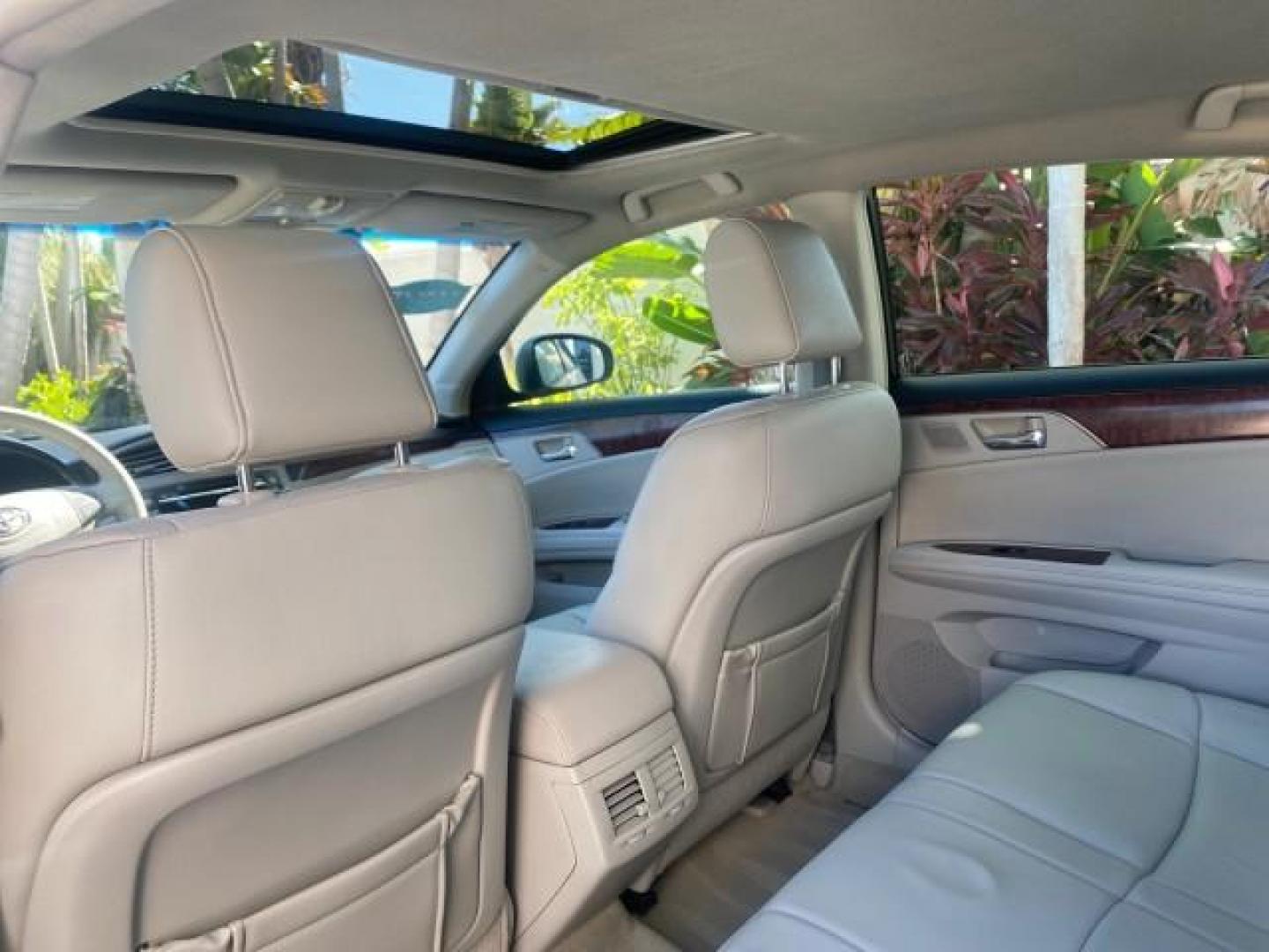 2011 Blizzard Pearl /Light Gray Toyota Avalon LOW MILES 75,626 40 SERVICES (4T1BK3DB4BU) with an 3.5L DOHC EFI 24-Valve V6 Engine engine, Automatic transmission, located at 4701 North Dixie Hwy, Pompano Beach, FL, 33064, (954) 422-2889, 26.240938, -80.123474 - OUR WEBPAGE FLORIDACARS1.COM HAS OVER 100 PHOTOS AND FREE CARFAX LINK 2011 TOYOTA AVALON LIMITED VIN: 4T1BK3DB4BU383335 4 T 1 B K 3 D B 4 B U 3 8 3 3 3 5 SEDAN 4 DR 3.5L V6 F DOHC 24V GASOLINE 29 MPG FRONT WHEEL DRIVE Features ABS Brakes Air Conditioning Alloy Wheels AM/FM Stereo Automatic Transmiss - Photo#82