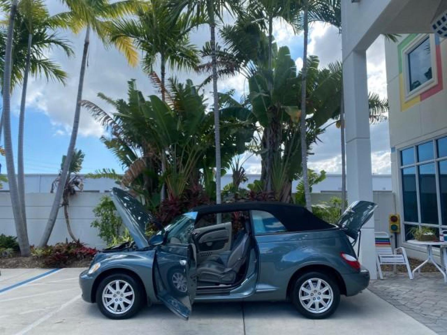 2006 Marine Blue Pearl /Pastel Slate Gray Chrysler PT Cruiser CONV Touring LOW MILES 36,241 (3C3JY55E06T) with an 2.4L DOHC SMPI 16-Valve I4 Engine engine, Automatic transmission, located at 4701 North Dixie Hwy, Pompano Beach, FL, 33064, (954) 422-2889, 26.240938, -80.123474 - OUR WEBPAGE FLORIDACARS1.COM HAS OVER 100 PHOTOS AND FREE CARFAX LINK 2006 CHRYSLER PT CRUISER TOURING TOP WORKS GREAT VIN: 3C3JY55E06T270148 3 C 3 J Y 5 5 E 0 6 T 2 7 0 1 4 8 CONVERTIBLE 2.4L I4 F DOHC 16V TURBO GASOLINE 26 MPG FRONT WHEEL DRIVE Features ABS Brakes Air Conditioning Alloy Wheels AM/ - Photo#8