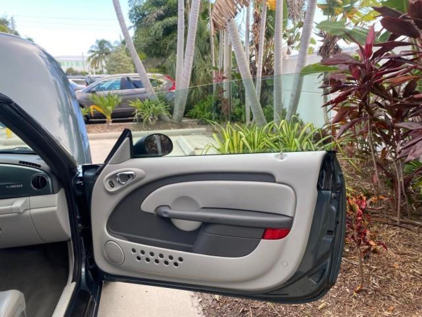 2006 Marine Blue Pearl /Pastel Slate Gray Chrysler PT Cruiser CONV Touring LOW MILES 36,241 (3C3JY55E06T) with an 2.4L DOHC SMPI 16-Valve I4 Engine engine, Automatic transmission, located at 4701 North Dixie Hwy, Pompano Beach, FL, 33064, (954) 422-2889, 26.240938, -80.123474 - OUR WEBPAGE FLORIDACARS1.COM HAS OVER 100 PHOTOS AND FREE CARFAX LINK 2006 CHRYSLER PT CRUISER TOURING TOP WORKS GREAT VIN: 3C3JY55E06T270148 3 C 3 J Y 5 5 E 0 6 T 2 7 0 1 4 8 CONVERTIBLE 2.4L I4 F DOHC 16V TURBO GASOLINE 26 MPG FRONT WHEEL DRIVE Features ABS Brakes Air Conditioning Alloy Wheels AM/ - Photo#11