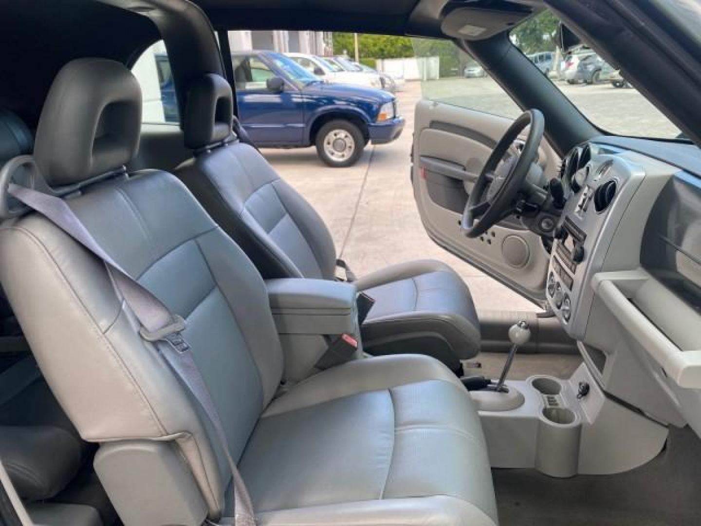 2006 Marine Blue Pearl /Pastel Slate Gray Chrysler PT Cruiser CONV Touring LOW MILES 36,241 (3C3JY55E06T) with an 2.4L DOHC SMPI 16-Valve I4 Engine engine, Automatic transmission, located at 4701 North Dixie Hwy, Pompano Beach, FL, 33064, (954) 422-2889, 26.240938, -80.123474 - OUR WEBPAGE FLORIDACARS1.COM HAS OVER 100 PHOTOS AND FREE CARFAX LINK 2006 CHRYSLER PT CRUISER TOURING TOP WORKS GREAT VIN: 3C3JY55E06T270148 3 C 3 J Y 5 5 E 0 6 T 2 7 0 1 4 8 CONVERTIBLE 2.4L I4 F DOHC 16V TURBO GASOLINE 26 MPG FRONT WHEEL DRIVE Features ABS Brakes Air Conditioning Alloy Wheels AM/ - Photo#12