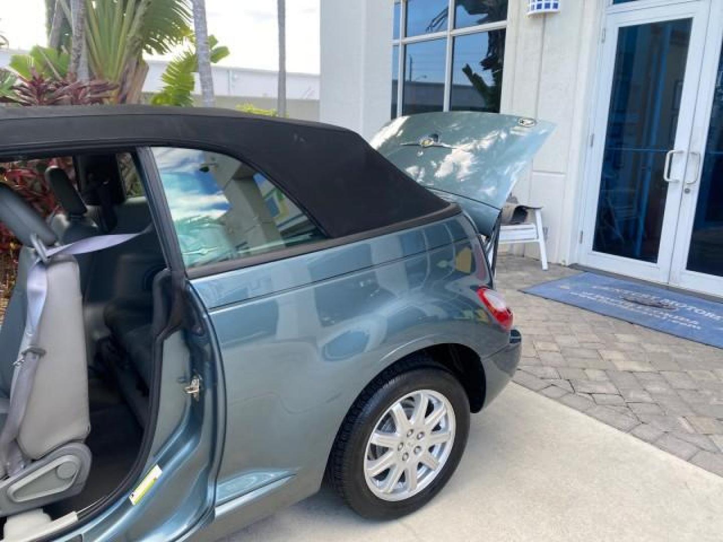 2006 Marine Blue Pearl /Pastel Slate Gray Chrysler PT Cruiser CONV Touring LOW MILES 36,241 (3C3JY55E06T) with an 2.4L DOHC SMPI 16-Valve I4 Engine engine, Automatic transmission, located at 4701 North Dixie Hwy, Pompano Beach, FL, 33064, (954) 422-2889, 26.240938, -80.123474 - OUR WEBPAGE FLORIDACARS1.COM HAS OVER 100 PHOTOS AND FREE CARFAX LINK 2006 CHRYSLER PT CRUISER TOURING TOP WORKS GREAT VIN: 3C3JY55E06T270148 3 C 3 J Y 5 5 E 0 6 T 2 7 0 1 4 8 CONVERTIBLE 2.4L I4 F DOHC 16V TURBO GASOLINE 26 MPG FRONT WHEEL DRIVE Features ABS Brakes Air Conditioning Alloy Wheels AM/ - Photo#13