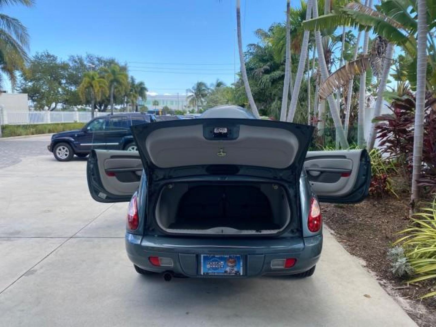 2006 Marine Blue Pearl /Pastel Slate Gray Chrysler PT Cruiser CONV Touring LOW MILES 36,241 (3C3JY55E06T) with an 2.4L DOHC SMPI 16-Valve I4 Engine engine, Automatic transmission, located at 4701 North Dixie Hwy, Pompano Beach, FL, 33064, (954) 422-2889, 26.240938, -80.123474 - OUR WEBPAGE FLORIDACARS1.COM HAS OVER 100 PHOTOS AND FREE CARFAX LINK 2006 CHRYSLER PT CRUISER TOURING TOP WORKS GREAT VIN: 3C3JY55E06T270148 3 C 3 J Y 5 5 E 0 6 T 2 7 0 1 4 8 CONVERTIBLE 2.4L I4 F DOHC 16V TURBO GASOLINE 26 MPG FRONT WHEEL DRIVE Features ABS Brakes Air Conditioning Alloy Wheels AM/ - Photo#15