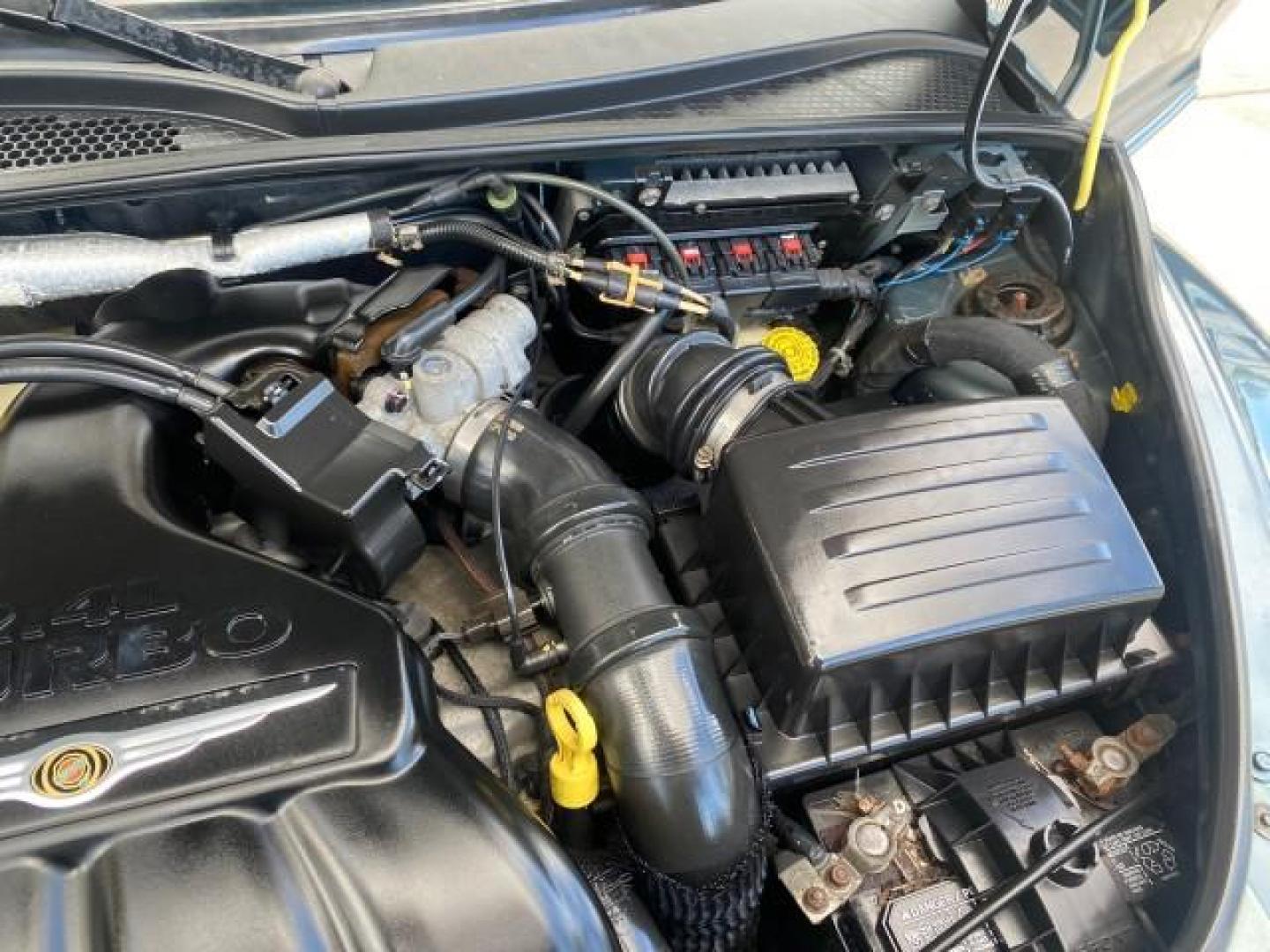 2006 Marine Blue Pearl /Pastel Slate Gray Chrysler PT Cruiser CONV Touring LOW MILES 36,241 (3C3JY55E06T) with an 2.4L DOHC SMPI 16-Valve I4 Engine engine, Automatic transmission, located at 4701 North Dixie Hwy, Pompano Beach, FL, 33064, (954) 422-2889, 26.240938, -80.123474 - OUR WEBPAGE FLORIDACARS1.COM HAS OVER 100 PHOTOS AND FREE CARFAX LINK 2006 CHRYSLER PT CRUISER TOURING TOP WORKS GREAT VIN: 3C3JY55E06T270148 3 C 3 J Y 5 5 E 0 6 T 2 7 0 1 4 8 CONVERTIBLE 2.4L I4 F DOHC 16V TURBO GASOLINE 26 MPG FRONT WHEEL DRIVE Features ABS Brakes Air Conditioning Alloy Wheels AM/ - Photo#26