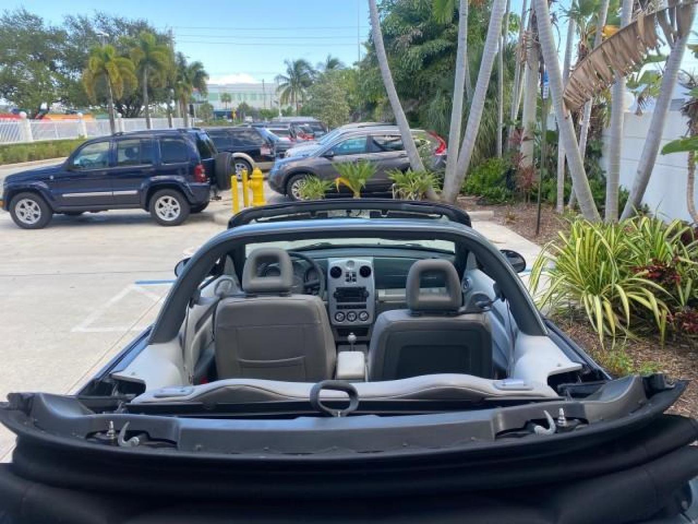 2006 Marine Blue Pearl /Pastel Slate Gray Chrysler PT Cruiser CONV Touring LOW MILES 36,241 (3C3JY55E06T) with an 2.4L DOHC SMPI 16-Valve I4 Engine engine, Automatic transmission, located at 4701 North Dixie Hwy, Pompano Beach, FL, 33064, (954) 422-2889, 26.240938, -80.123474 - OUR WEBPAGE FLORIDACARS1.COM HAS OVER 100 PHOTOS AND FREE CARFAX LINK 2006 CHRYSLER PT CRUISER TOURING TOP WORKS GREAT VIN: 3C3JY55E06T270148 3 C 3 J Y 5 5 E 0 6 T 2 7 0 1 4 8 CONVERTIBLE 2.4L I4 F DOHC 16V TURBO GASOLINE 26 MPG FRONT WHEEL DRIVE Features ABS Brakes Air Conditioning Alloy Wheels AM/ - Photo#47