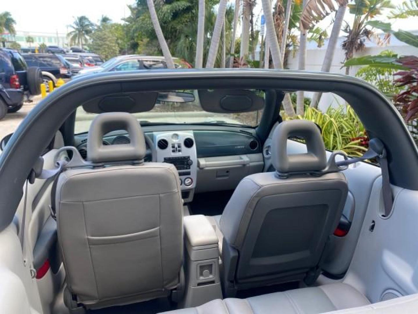 2006 Marine Blue Pearl /Pastel Slate Gray Chrysler PT Cruiser CONV Touring LOW MILES 36,241 (3C3JY55E06T) with an 2.4L DOHC SMPI 16-Valve I4 Engine engine, Automatic transmission, located at 4701 North Dixie Hwy, Pompano Beach, FL, 33064, (954) 422-2889, 26.240938, -80.123474 - OUR WEBPAGE FLORIDACARS1.COM HAS OVER 100 PHOTOS AND FREE CARFAX LINK 2006 CHRYSLER PT CRUISER TOURING TOP WORKS GREAT VIN: 3C3JY55E06T270148 3 C 3 J Y 5 5 E 0 6 T 2 7 0 1 4 8 CONVERTIBLE 2.4L I4 F DOHC 16V TURBO GASOLINE 26 MPG FRONT WHEEL DRIVE Features ABS Brakes Air Conditioning Alloy Wheels AM/ - Photo#48