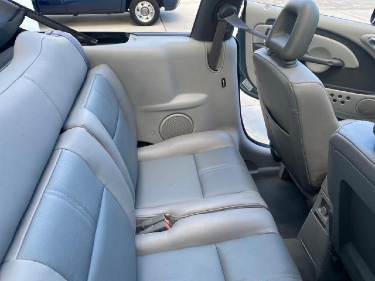 2006 Marine Blue Pearl /Pastel Slate Gray Chrysler PT Cruiser CONV Touring LOW MILES 36,241 (3C3JY55E06T) with an 2.4L DOHC SMPI 16-Valve I4 Engine engine, Automatic transmission, located at 4701 North Dixie Hwy, Pompano Beach, FL, 33064, (954) 422-2889, 26.240938, -80.123474 - OUR WEBPAGE FLORIDACARS1.COM HAS OVER 100 PHOTOS AND FREE CARFAX LINK 2006 CHRYSLER PT CRUISER TOURING TOP WORKS GREAT VIN: 3C3JY55E06T270148 3 C 3 J Y 5 5 E 0 6 T 2 7 0 1 4 8 CONVERTIBLE 2.4L I4 F DOHC 16V TURBO GASOLINE 26 MPG FRONT WHEEL DRIVE Features ABS Brakes Air Conditioning Alloy Wheels AM/ - Photo#51