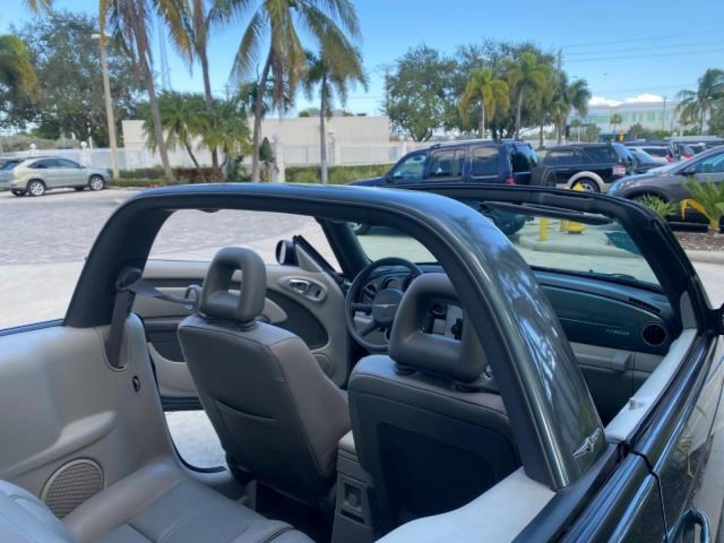 2006 Marine Blue Pearl /Pastel Slate Gray Chrysler PT Cruiser CONV Touring LOW MILES 36,241 (3C3JY55E06T) with an 2.4L DOHC SMPI 16-Valve I4 Engine engine, Automatic transmission, located at 4701 North Dixie Hwy, Pompano Beach, FL, 33064, (954) 422-2889, 26.240938, -80.123474 - OUR WEBPAGE FLORIDACARS1.COM HAS OVER 100 PHOTOS AND FREE CARFAX LINK 2006 CHRYSLER PT CRUISER TOURING TOP WORKS GREAT VIN: 3C3JY55E06T270148 3 C 3 J Y 5 5 E 0 6 T 2 7 0 1 4 8 CONVERTIBLE 2.4L I4 F DOHC 16V TURBO GASOLINE 26 MPG FRONT WHEEL DRIVE Features ABS Brakes Air Conditioning Alloy Wheels AM/ - Photo#52