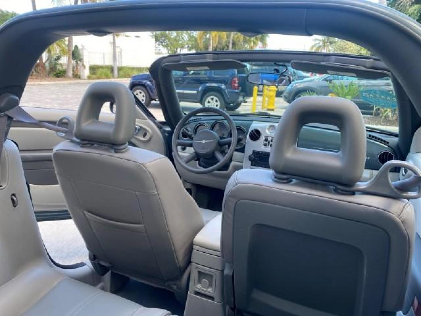 2006 Marine Blue Pearl /Pastel Slate Gray Chrysler PT Cruiser CONV Touring LOW MILES 36,241 (3C3JY55E06T) with an 2.4L DOHC SMPI 16-Valve I4 Engine engine, Automatic transmission, located at 4701 North Dixie Hwy, Pompano Beach, FL, 33064, (954) 422-2889, 26.240938, -80.123474 - OUR WEBPAGE FLORIDACARS1.COM HAS OVER 100 PHOTOS AND FREE CARFAX LINK 2006 CHRYSLER PT CRUISER TOURING TOP WORKS GREAT VIN: 3C3JY55E06T270148 3 C 3 J Y 5 5 E 0 6 T 2 7 0 1 4 8 CONVERTIBLE 2.4L I4 F DOHC 16V TURBO GASOLINE 26 MPG FRONT WHEEL DRIVE Features ABS Brakes Air Conditioning Alloy Wheels AM/ - Photo#53