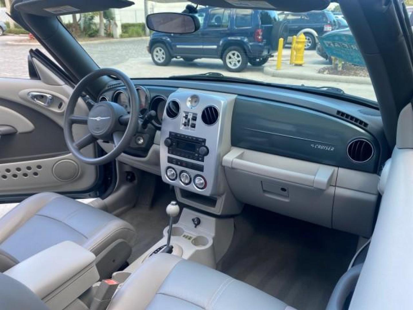 2006 Marine Blue Pearl /Pastel Slate Gray Chrysler PT Cruiser CONV Touring LOW MILES 36,241 (3C3JY55E06T) with an 2.4L DOHC SMPI 16-Valve I4 Engine engine, Automatic transmission, located at 4701 North Dixie Hwy, Pompano Beach, FL, 33064, (954) 422-2889, 26.240938, -80.123474 - OUR WEBPAGE FLORIDACARS1.COM HAS OVER 100 PHOTOS AND FREE CARFAX LINK 2006 CHRYSLER PT CRUISER TOURING TOP WORKS GREAT VIN: 3C3JY55E06T270148 3 C 3 J Y 5 5 E 0 6 T 2 7 0 1 4 8 CONVERTIBLE 2.4L I4 F DOHC 16V TURBO GASOLINE 26 MPG FRONT WHEEL DRIVE Features ABS Brakes Air Conditioning Alloy Wheels AM/ - Photo#54