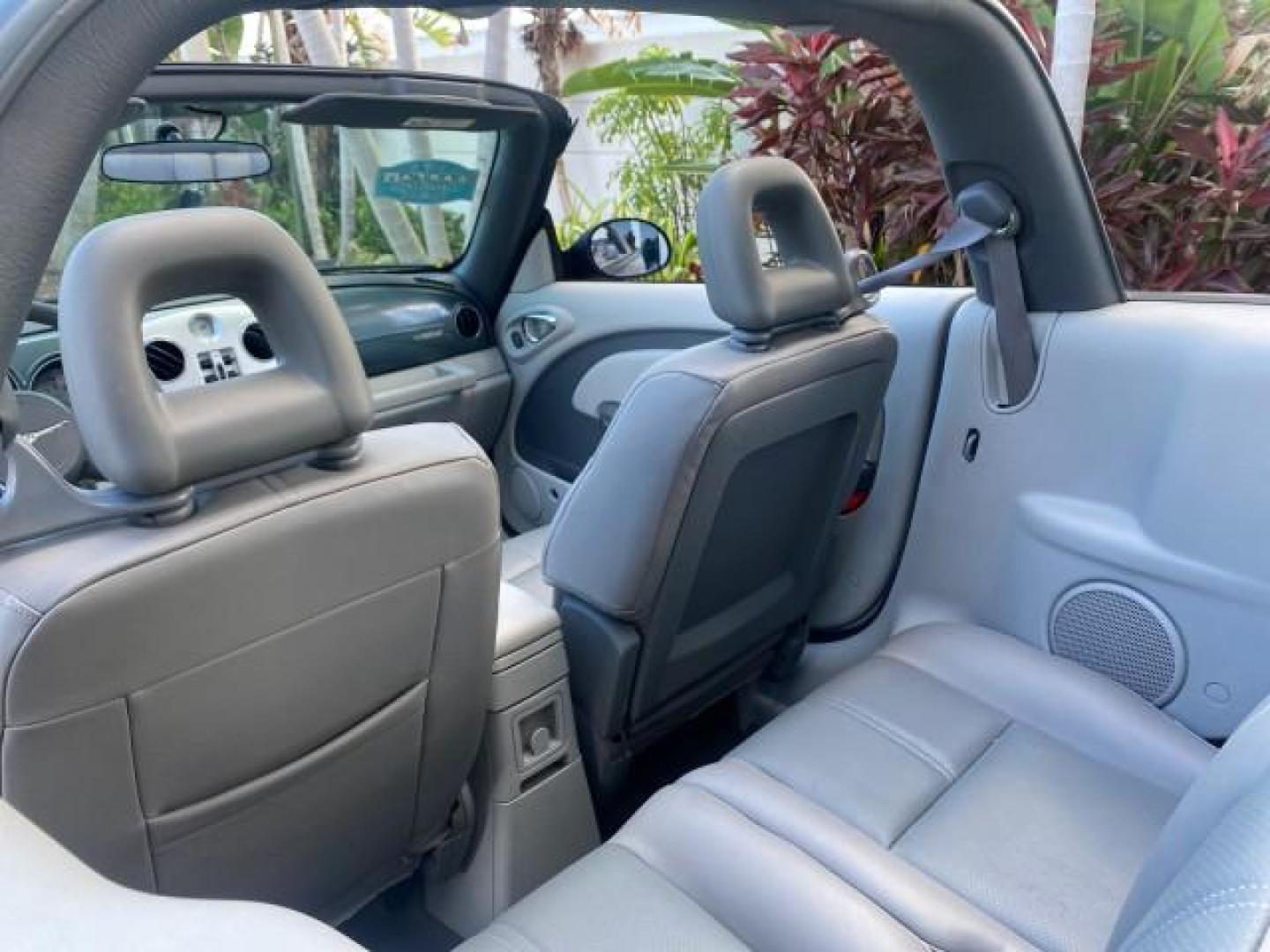 2006 Marine Blue Pearl /Pastel Slate Gray Chrysler PT Cruiser CONV Touring LOW MILES 36,241 (3C3JY55E06T) with an 2.4L DOHC SMPI 16-Valve I4 Engine engine, Automatic transmission, located at 4701 North Dixie Hwy, Pompano Beach, FL, 33064, (954) 422-2889, 26.240938, -80.123474 - OUR WEBPAGE FLORIDACARS1.COM HAS OVER 100 PHOTOS AND FREE CARFAX LINK 2006 CHRYSLER PT CRUISER TOURING TOP WORKS GREAT VIN: 3C3JY55E06T270148 3 C 3 J Y 5 5 E 0 6 T 2 7 0 1 4 8 CONVERTIBLE 2.4L I4 F DOHC 16V TURBO GASOLINE 26 MPG FRONT WHEEL DRIVE Features ABS Brakes Air Conditioning Alloy Wheels AM/ - Photo#55