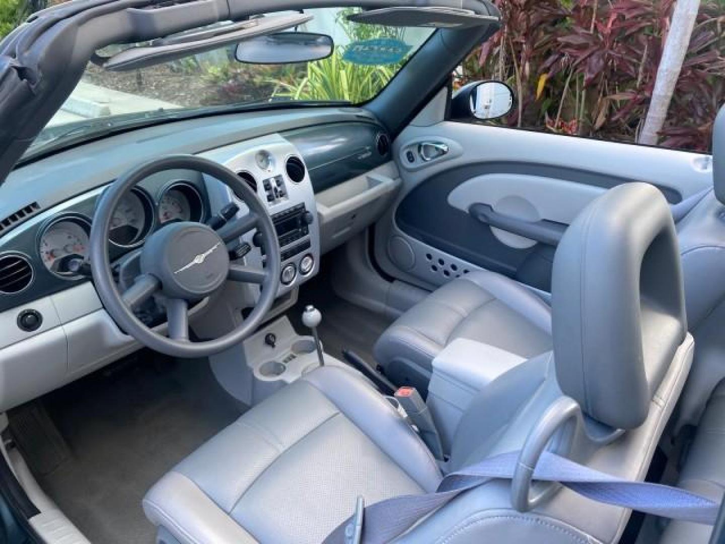 2006 Marine Blue Pearl /Pastel Slate Gray Chrysler PT Cruiser CONV Touring LOW MILES 36,241 (3C3JY55E06T) with an 2.4L DOHC SMPI 16-Valve I4 Engine engine, Automatic transmission, located at 4701 North Dixie Hwy, Pompano Beach, FL, 33064, (954) 422-2889, 26.240938, -80.123474 - OUR WEBPAGE FLORIDACARS1.COM HAS OVER 100 PHOTOS AND FREE CARFAX LINK 2006 CHRYSLER PT CRUISER TOURING TOP WORKS GREAT VIN: 3C3JY55E06T270148 3 C 3 J Y 5 5 E 0 6 T 2 7 0 1 4 8 CONVERTIBLE 2.4L I4 F DOHC 16V TURBO GASOLINE 26 MPG FRONT WHEEL DRIVE Features ABS Brakes Air Conditioning Alloy Wheels AM/ - Photo#57