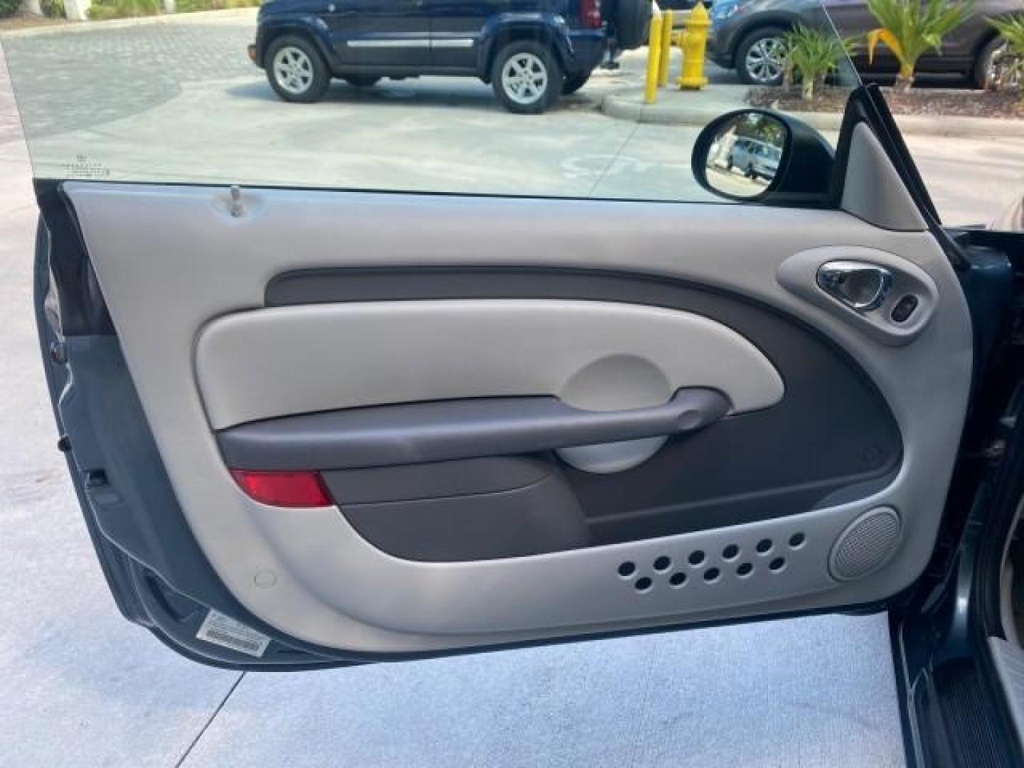 2006 Marine Blue Pearl /Pastel Slate Gray Chrysler PT Cruiser CONV Touring LOW MILES 36,241 (3C3JY55E06T) with an 2.4L DOHC SMPI 16-Valve I4 Engine engine, Automatic transmission, located at 4701 North Dixie Hwy, Pompano Beach, FL, 33064, (954) 422-2889, 26.240938, -80.123474 - OUR WEBPAGE FLORIDACARS1.COM HAS OVER 100 PHOTOS AND FREE CARFAX LINK 2006 CHRYSLER PT CRUISER TOURING TOP WORKS GREAT VIN: 3C3JY55E06T270148 3 C 3 J Y 5 5 E 0 6 T 2 7 0 1 4 8 CONVERTIBLE 2.4L I4 F DOHC 16V TURBO GASOLINE 26 MPG FRONT WHEEL DRIVE Features ABS Brakes Air Conditioning Alloy Wheels AM/ - Photo#63