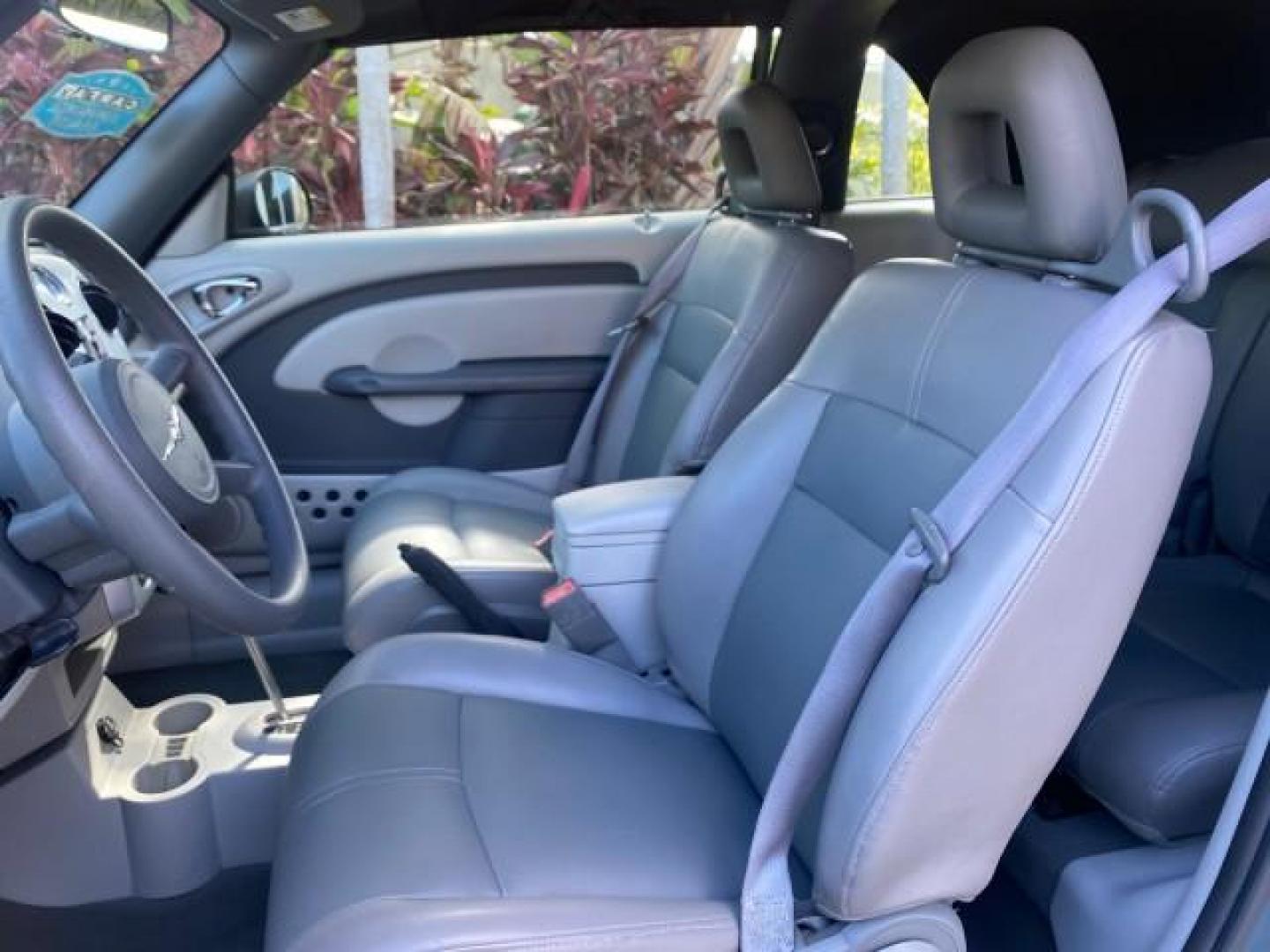 2006 Marine Blue Pearl /Pastel Slate Gray Chrysler PT Cruiser CONV Touring LOW MILES 36,241 (3C3JY55E06T) with an 2.4L DOHC SMPI 16-Valve I4 Engine engine, Automatic transmission, located at 4701 North Dixie Hwy, Pompano Beach, FL, 33064, (954) 422-2889, 26.240938, -80.123474 - OUR WEBPAGE FLORIDACARS1.COM HAS OVER 100 PHOTOS AND FREE CARFAX LINK 2006 CHRYSLER PT CRUISER TOURING TOP WORKS GREAT VIN: 3C3JY55E06T270148 3 C 3 J Y 5 5 E 0 6 T 2 7 0 1 4 8 CONVERTIBLE 2.4L I4 F DOHC 16V TURBO GASOLINE 26 MPG FRONT WHEEL DRIVE Features ABS Brakes Air Conditioning Alloy Wheels AM/ - Photo#64