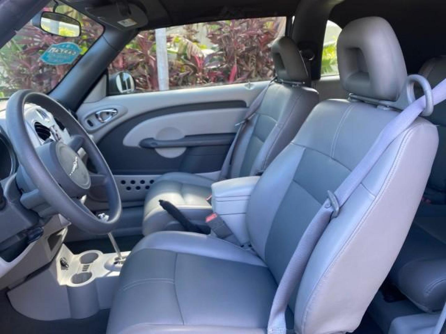 2006 Marine Blue Pearl /Pastel Slate Gray Chrysler PT Cruiser CONV Touring LOW MILES 36,241 (3C3JY55E06T) with an 2.4L DOHC SMPI 16-Valve I4 Engine engine, Automatic transmission, located at 4701 North Dixie Hwy, Pompano Beach, FL, 33064, (954) 422-2889, 26.240938, -80.123474 - OUR WEBPAGE FLORIDACARS1.COM HAS OVER 100 PHOTOS AND FREE CARFAX LINK 2006 CHRYSLER PT CRUISER TOURING TOP WORKS GREAT VIN: 3C3JY55E06T270148 3 C 3 J Y 5 5 E 0 6 T 2 7 0 1 4 8 CONVERTIBLE 2.4L I4 F DOHC 16V TURBO GASOLINE 26 MPG FRONT WHEEL DRIVE Features ABS Brakes Air Conditioning Alloy Wheels AM/ - Photo#65