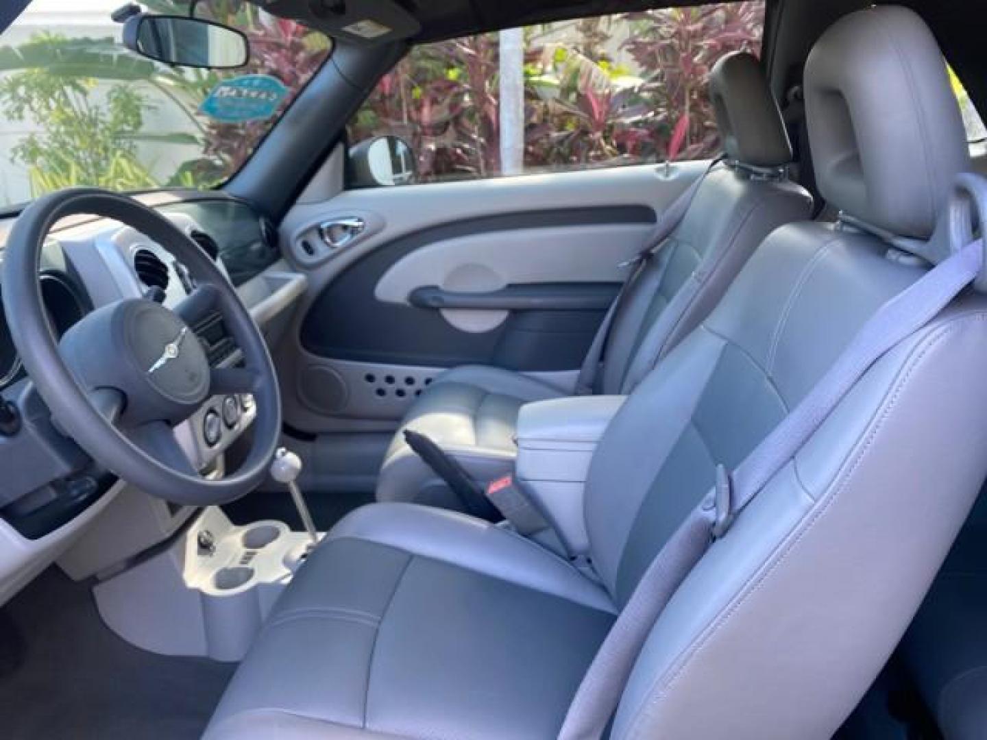 2006 Marine Blue Pearl /Pastel Slate Gray Chrysler PT Cruiser CONV Touring LOW MILES 36,241 (3C3JY55E06T) with an 2.4L DOHC SMPI 16-Valve I4 Engine engine, Automatic transmission, located at 4701 North Dixie Hwy, Pompano Beach, FL, 33064, (954) 422-2889, 26.240938, -80.123474 - OUR WEBPAGE FLORIDACARS1.COM HAS OVER 100 PHOTOS AND FREE CARFAX LINK 2006 CHRYSLER PT CRUISER TOURING TOP WORKS GREAT VIN: 3C3JY55E06T270148 3 C 3 J Y 5 5 E 0 6 T 2 7 0 1 4 8 CONVERTIBLE 2.4L I4 F DOHC 16V TURBO GASOLINE 26 MPG FRONT WHEEL DRIVE Features ABS Brakes Air Conditioning Alloy Wheels AM/ - Photo#66