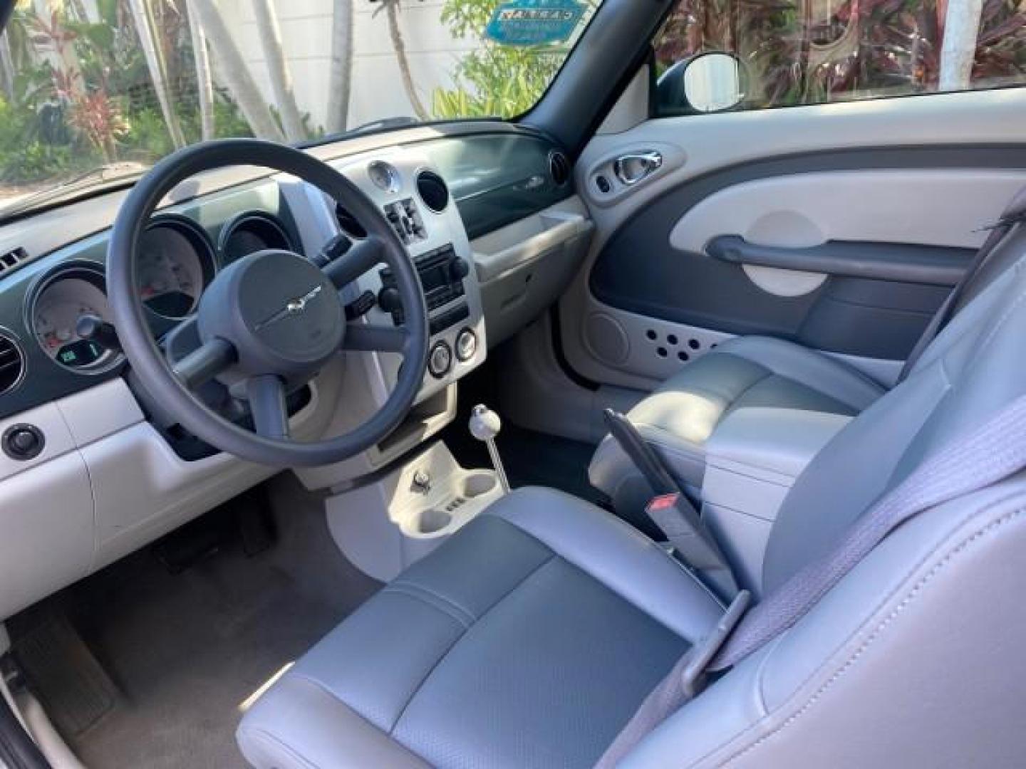 2006 Marine Blue Pearl /Pastel Slate Gray Chrysler PT Cruiser CONV Touring LOW MILES 36,241 (3C3JY55E06T) with an 2.4L DOHC SMPI 16-Valve I4 Engine engine, Automatic transmission, located at 4701 North Dixie Hwy, Pompano Beach, FL, 33064, (954) 422-2889, 26.240938, -80.123474 - OUR WEBPAGE FLORIDACARS1.COM HAS OVER 100 PHOTOS AND FREE CARFAX LINK 2006 CHRYSLER PT CRUISER TOURING TOP WORKS GREAT VIN: 3C3JY55E06T270148 3 C 3 J Y 5 5 E 0 6 T 2 7 0 1 4 8 CONVERTIBLE 2.4L I4 F DOHC 16V TURBO GASOLINE 26 MPG FRONT WHEEL DRIVE Features ABS Brakes Air Conditioning Alloy Wheels AM/ - Photo#68