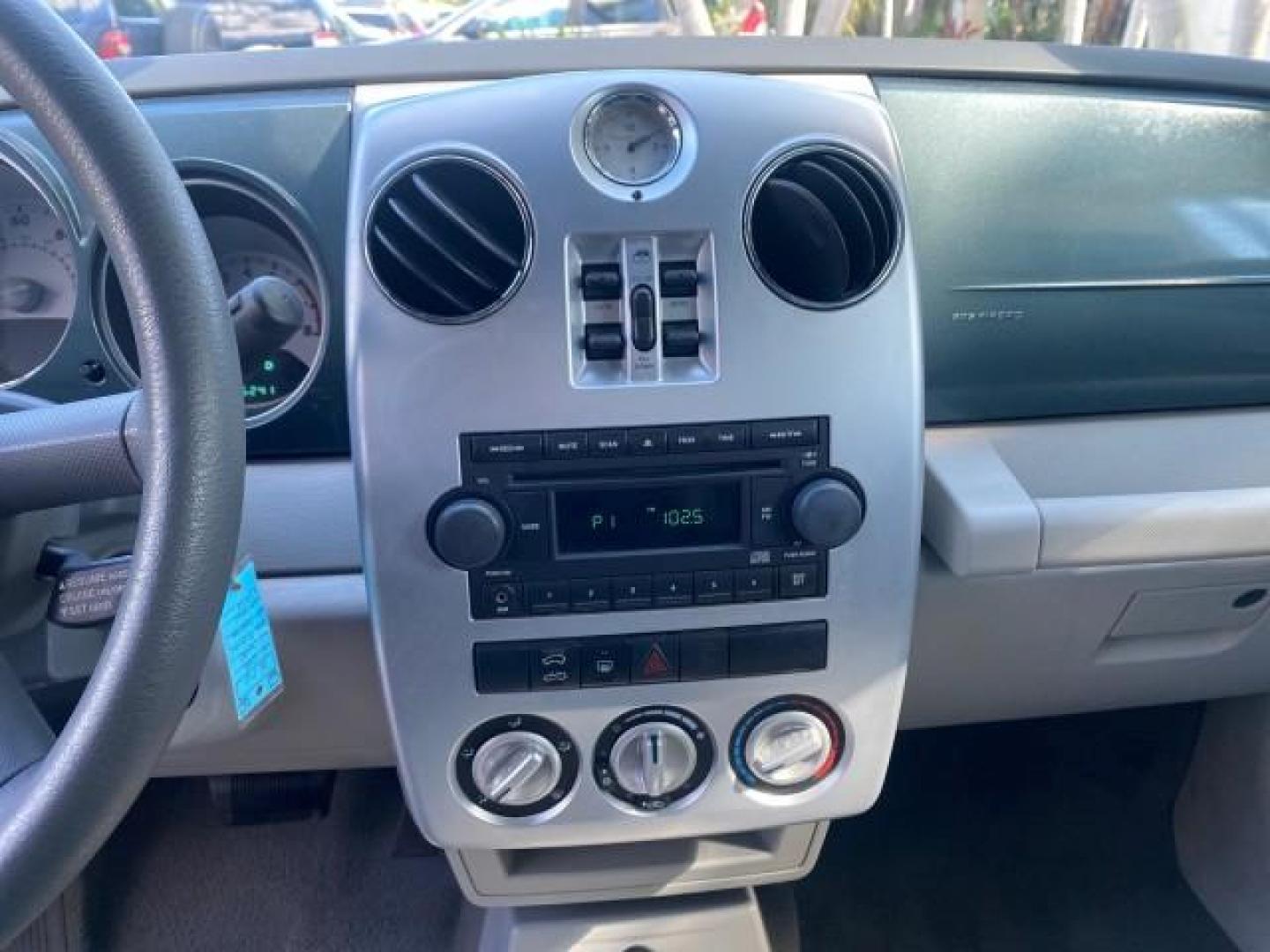 2006 Marine Blue Pearl /Pastel Slate Gray Chrysler PT Cruiser CONV Touring LOW MILES 36,241 (3C3JY55E06T) with an 2.4L DOHC SMPI 16-Valve I4 Engine engine, Automatic transmission, located at 4701 North Dixie Hwy, Pompano Beach, FL, 33064, (954) 422-2889, 26.240938, -80.123474 - OUR WEBPAGE FLORIDACARS1.COM HAS OVER 100 PHOTOS AND FREE CARFAX LINK 2006 CHRYSLER PT CRUISER TOURING TOP WORKS GREAT VIN: 3C3JY55E06T270148 3 C 3 J Y 5 5 E 0 6 T 2 7 0 1 4 8 CONVERTIBLE 2.4L I4 F DOHC 16V TURBO GASOLINE 26 MPG FRONT WHEEL DRIVE Features ABS Brakes Air Conditioning Alloy Wheels AM/ - Photo#77