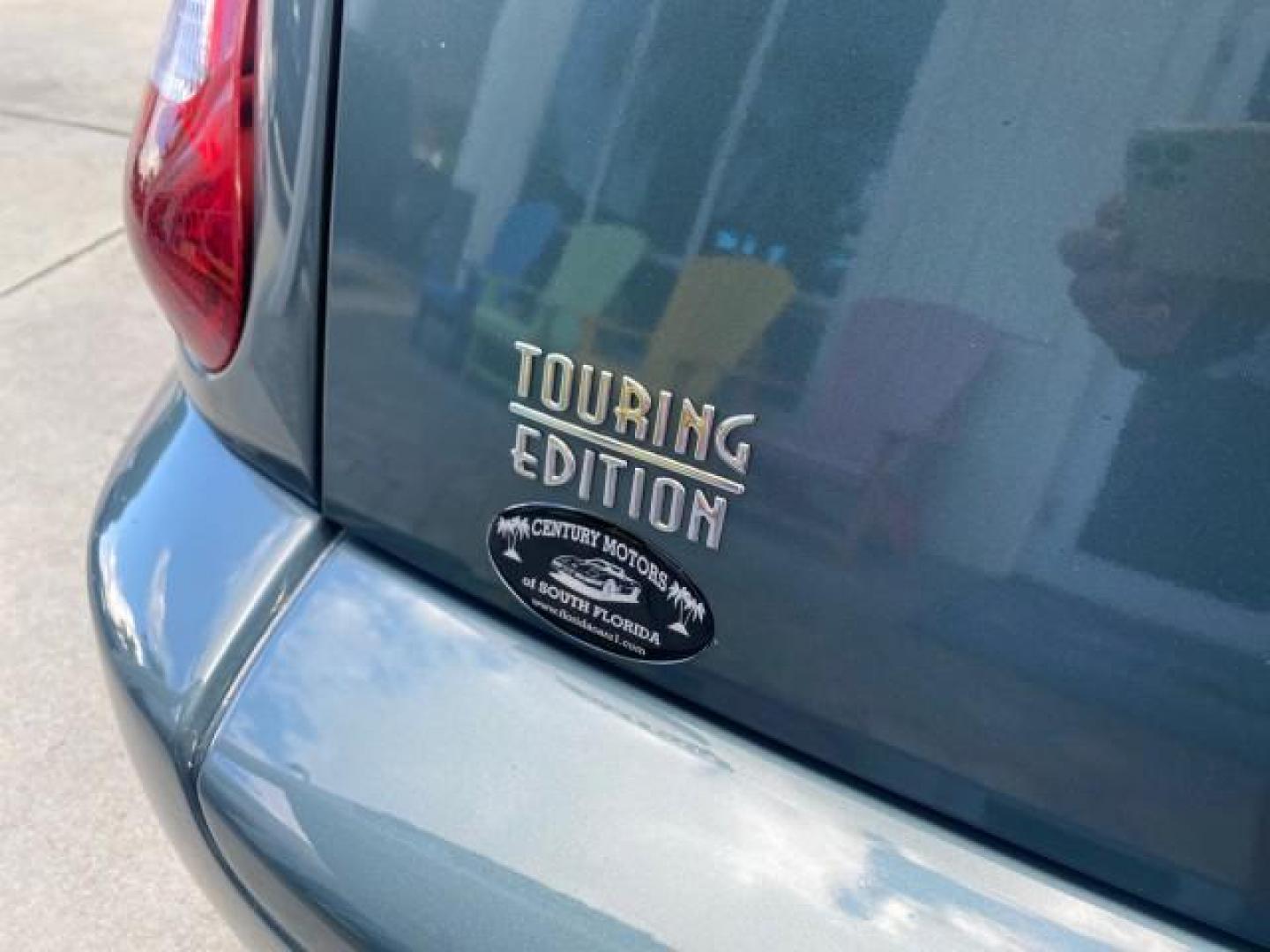 2006 Marine Blue Pearl /Pastel Slate Gray Chrysler PT Cruiser CONV Touring LOW MILES 36,241 (3C3JY55E06T) with an 2.4L DOHC SMPI 16-Valve I4 Engine engine, Automatic transmission, located at 4701 North Dixie Hwy, Pompano Beach, FL, 33064, (954) 422-2889, 26.240938, -80.123474 - OUR WEBPAGE FLORIDACARS1.COM HAS OVER 100 PHOTOS AND FREE CARFAX LINK 2006 CHRYSLER PT CRUISER TOURING TOP WORKS GREAT VIN: 3C3JY55E06T270148 3 C 3 J Y 5 5 E 0 6 T 2 7 0 1 4 8 CONVERTIBLE 2.4L I4 F DOHC 16V TURBO GASOLINE 26 MPG FRONT WHEEL DRIVE Features ABS Brakes Air Conditioning Alloy Wheels AM/ - Photo#99