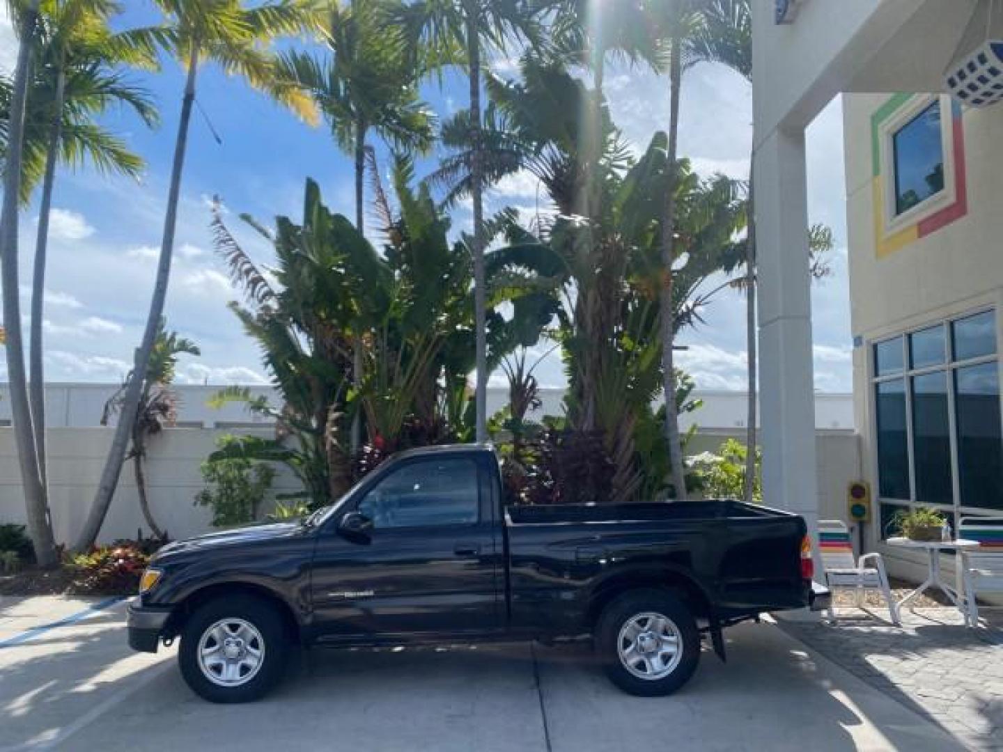 2002 Black Sand Pearl /Charcoal Toyota Tacoma 1 OWNER AUTO AC 4 CYL (5TENL42N02Z) with an 2.4L DOHC EFI 16-Valve I4 Engine engine, Automatic transmission, located at 4701 North Dixie Hwy, Pompano Beach, FL, 33064, (954) 422-2889, 26.240938, -80.123474 - OUR WEBPAGE FLORIDACARS1.COM HAS OVER 100 PHOTOS AND FREE CARFAX LINK 2002 TOYOTA TACOMA VIN: 5TENL42N02Z111289 5 T E N L 4 2 N 0 2 Z 1 1 1 2 8 9 PICKUP 2.4L I4 F DOHC GASOLINE 29 MPG REAR WHEEL DRIVE Features Air Conditioning AM/FM Stereo Automatic Transmission Bed Liner Cassette Player Cloth Seats - Photo#4