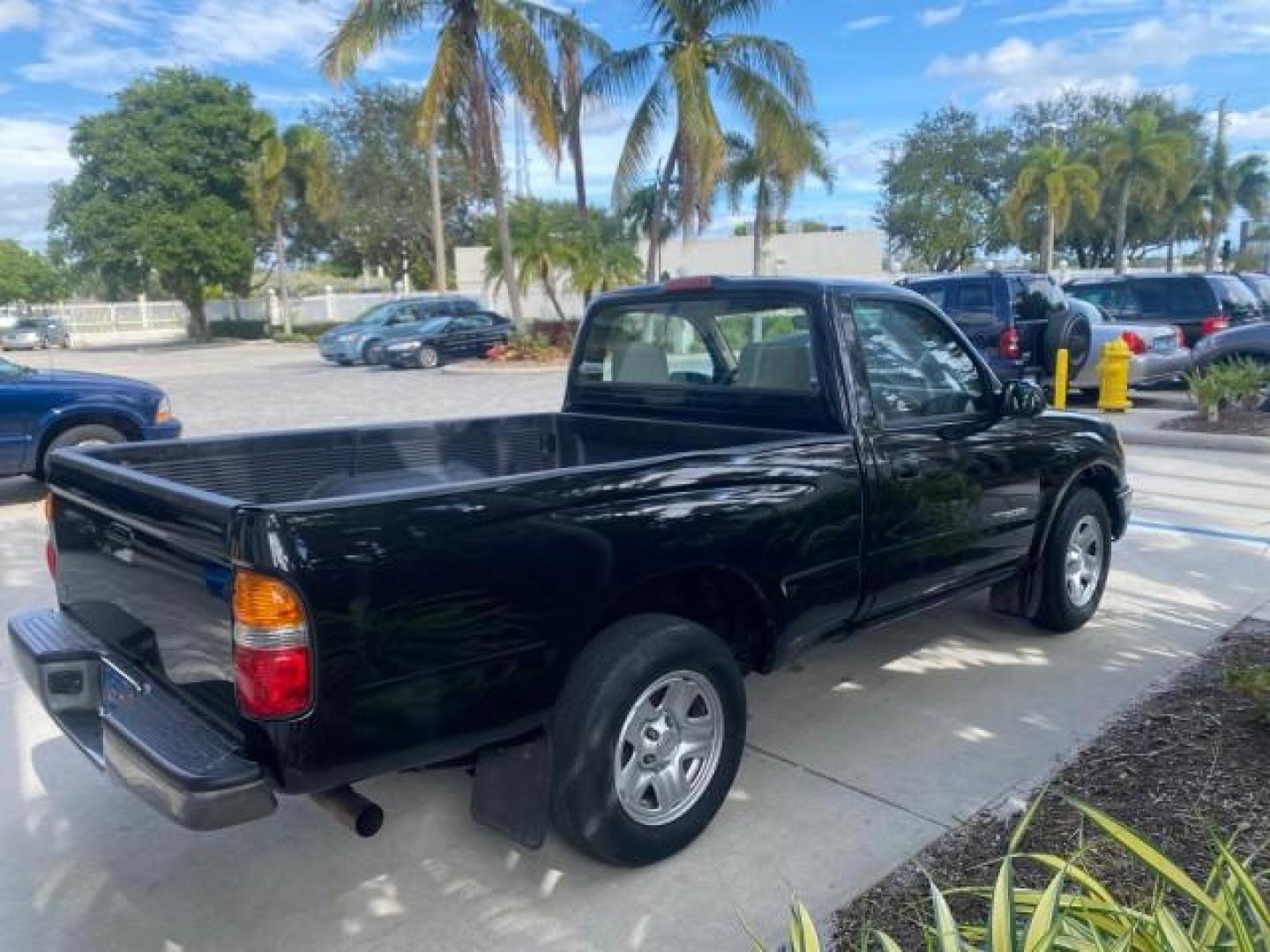 2002 Black Sand Pearl /Charcoal Toyota Tacoma 1 OWNER AUTO AC 4 CYL (5TENL42N02Z) with an 2.4L DOHC EFI 16-Valve I4 Engine engine, Automatic transmission, located at 4701 North Dixie Hwy, Pompano Beach, FL, 33064, (954) 422-2889, 26.240938, -80.123474 - OUR WEBPAGE FLORIDACARS1.COM HAS OVER 100 PHOTOS AND FREE CARFAX LINK 2002 TOYOTA TACOMA VIN: 5TENL42N02Z111289 5 T E N L 4 2 N 0 2 Z 1 1 1 2 8 9 PICKUP 2.4L I4 F DOHC GASOLINE 29 MPG REAR WHEEL DRIVE Features Air Conditioning AM/FM Stereo Automatic Transmission Bed Liner Cassette Player Cloth Seats - Photo#7