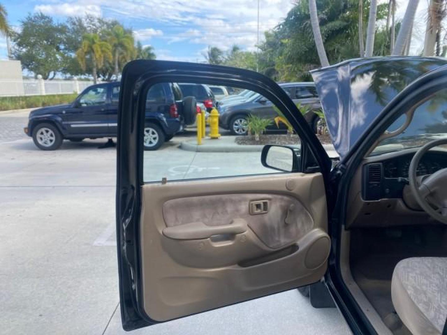 2002 Black Sand Pearl /Charcoal Toyota Tacoma 1 OWNER AUTO AC 4 CYL (5TENL42N02Z) with an 2.4L DOHC EFI 16-Valve I4 Engine engine, Automatic transmission, located at 4701 North Dixie Hwy, Pompano Beach, FL, 33064, (954) 422-2889, 26.240938, -80.123474 - OUR WEBPAGE FLORIDACARS1.COM HAS OVER 100 PHOTOS AND FREE CARFAX LINK 2002 TOYOTA TACOMA VIN: 5TENL42N02Z111289 5 T E N L 4 2 N 0 2 Z 1 1 1 2 8 9 PICKUP 2.4L I4 F DOHC GASOLINE 29 MPG REAR WHEEL DRIVE Features Air Conditioning AM/FM Stereo Automatic Transmission Bed Liner Cassette Player Cloth Seats - Photo#9