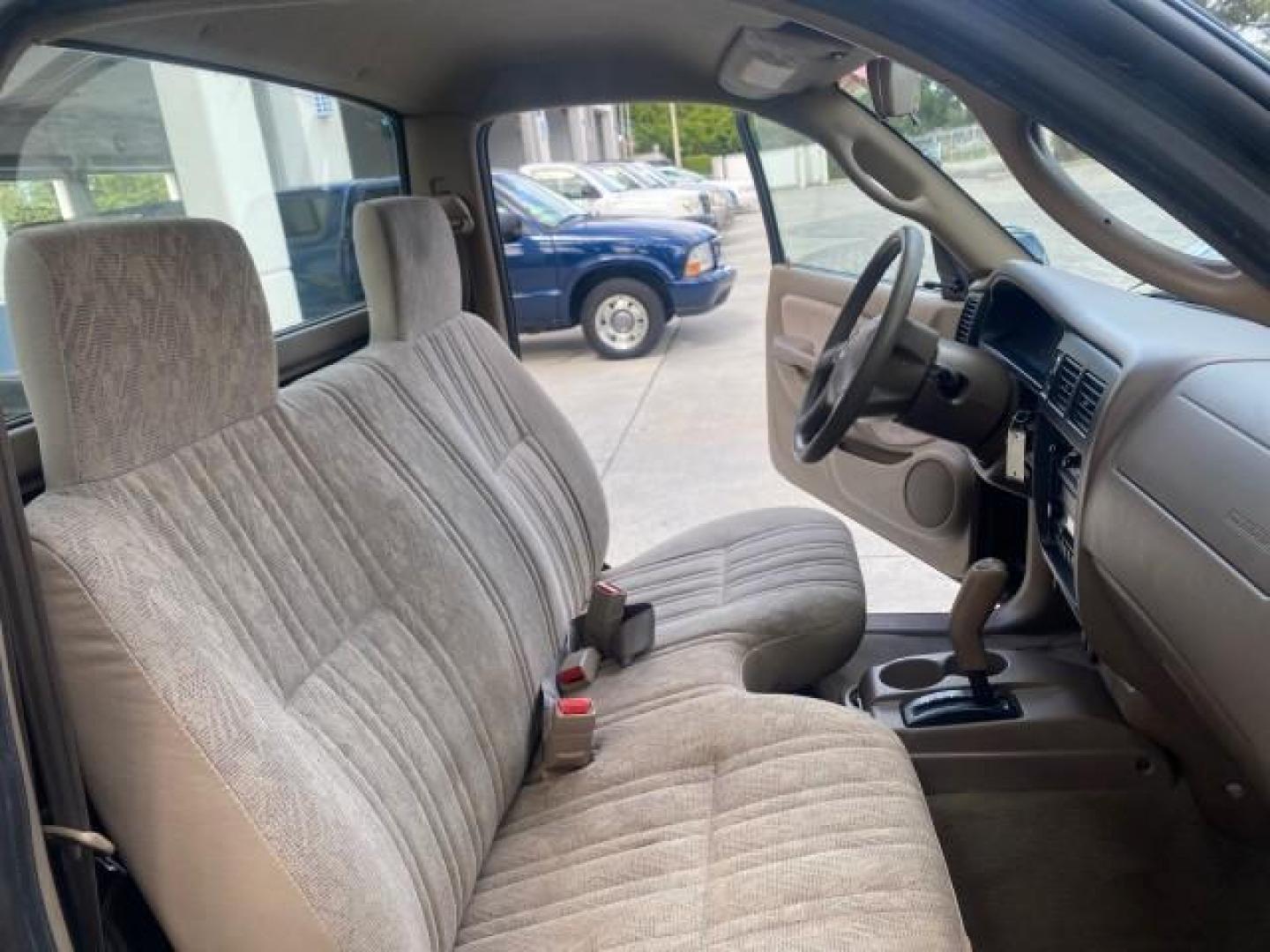 2002 Black Sand Pearl /Charcoal Toyota Tacoma 1 OWNER AUTO AC 4 CYL (5TENL42N02Z) with an 2.4L DOHC EFI 16-Valve I4 Engine engine, Automatic transmission, located at 4701 North Dixie Hwy, Pompano Beach, FL, 33064, (954) 422-2889, 26.240938, -80.123474 - OUR WEBPAGE FLORIDACARS1.COM HAS OVER 100 PHOTOS AND FREE CARFAX LINK 2002 TOYOTA TACOMA VIN: 5TENL42N02Z111289 5 T E N L 4 2 N 0 2 Z 1 1 1 2 8 9 PICKUP 2.4L I4 F DOHC GASOLINE 29 MPG REAR WHEEL DRIVE Features Air Conditioning AM/FM Stereo Automatic Transmission Bed Liner Cassette Player Cloth Seats - Photo#12