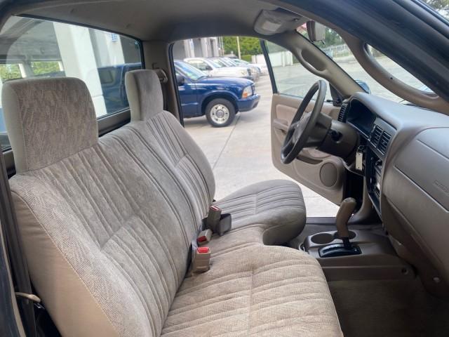 2002 Black Sand Pearl /Charcoal Toyota Tacoma 1 OWNER AUTO AC 4 CYL (5TENL42N02Z) with an 2.4L DOHC EFI 16-Valve I4 Engine engine, Automatic transmission, located at 4701 North Dixie Hwy, Pompano Beach, FL, 33064, (954) 422-2889, 26.240938, -80.123474 - OUR WEBPAGE FLORIDACARS1.COM HAS OVER 100 PHOTOS AND FREE CARFAX LINK 2002 TOYOTA TACOMA VIN: 5TENL42N02Z111289 5 T E N L 4 2 N 0 2 Z 1 1 1 2 8 9 PICKUP 2.4L I4 F DOHC GASOLINE 29 MPG REAR WHEEL DRIVE Features Air Conditioning AM/FM Stereo Automatic Transmission Bed Liner Cassette Player Cloth Seats - Photo#12