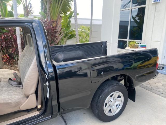 2002 Black Sand Pearl /Charcoal Toyota Tacoma 1 OWNER AUTO AC 4 CYL (5TENL42N02Z) with an 2.4L DOHC EFI 16-Valve I4 Engine engine, Automatic transmission, located at 4701 North Dixie Hwy, Pompano Beach, FL, 33064, (954) 422-2889, 26.240938, -80.123474 - OUR WEBPAGE FLORIDACARS1.COM HAS OVER 100 PHOTOS AND FREE CARFAX LINK 2002 TOYOTA TACOMA VIN: 5TENL42N02Z111289 5 T E N L 4 2 N 0 2 Z 1 1 1 2 8 9 PICKUP 2.4L I4 F DOHC GASOLINE 29 MPG REAR WHEEL DRIVE Features Air Conditioning AM/FM Stereo Automatic Transmission Bed Liner Cassette Player Cloth Seats - Photo#13