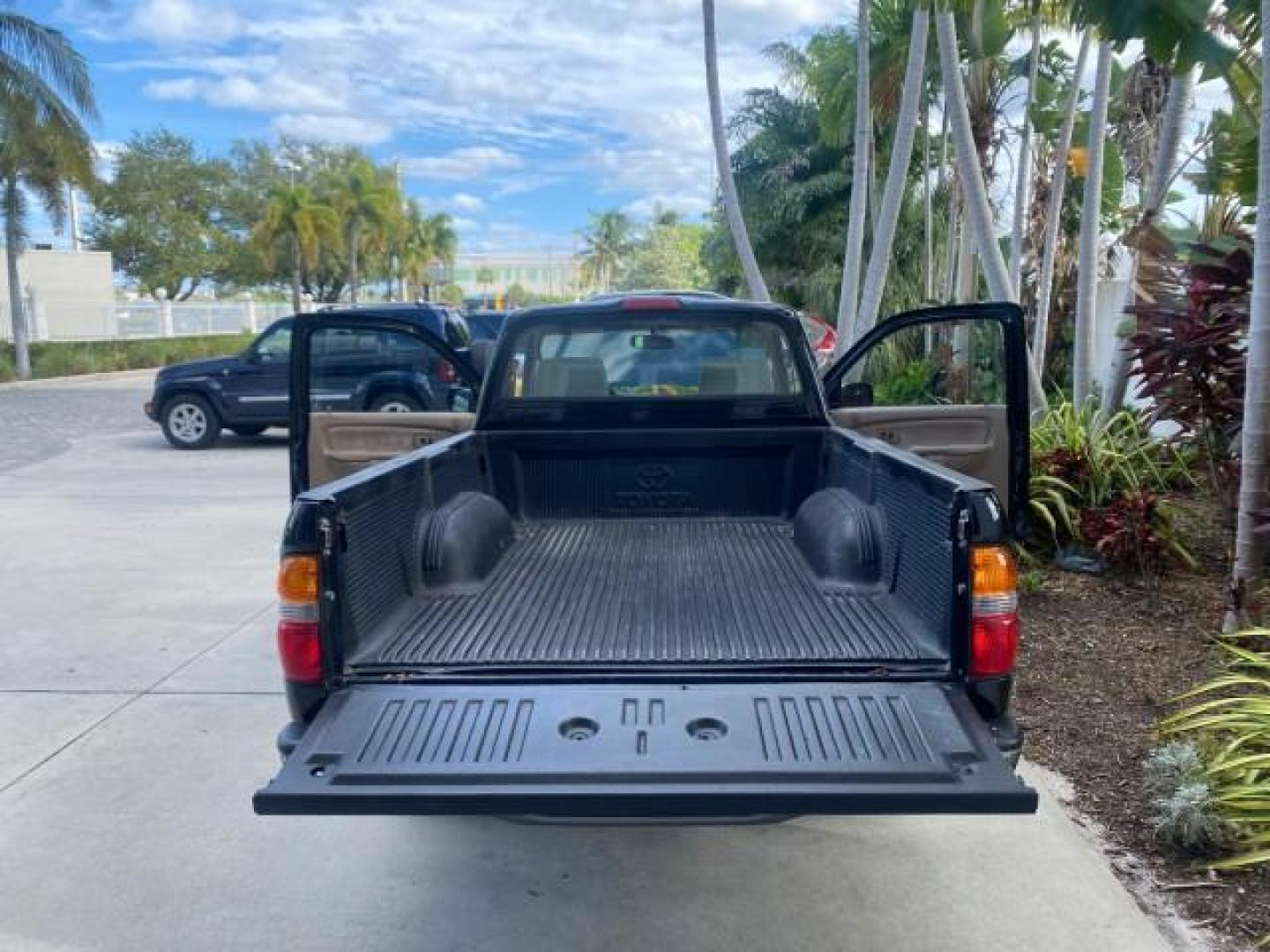 2002 Black Sand Pearl /Charcoal Toyota Tacoma 1 OWNER AUTO AC 4 CYL (5TENL42N02Z) with an 2.4L DOHC EFI 16-Valve I4 Engine engine, Automatic transmission, located at 4701 North Dixie Hwy, Pompano Beach, FL, 33064, (954) 422-2889, 26.240938, -80.123474 - OUR WEBPAGE FLORIDACARS1.COM HAS OVER 100 PHOTOS AND FREE CARFAX LINK 2002 TOYOTA TACOMA VIN: 5TENL42N02Z111289 5 T E N L 4 2 N 0 2 Z 1 1 1 2 8 9 PICKUP 2.4L I4 F DOHC GASOLINE 29 MPG REAR WHEEL DRIVE Features Air Conditioning AM/FM Stereo Automatic Transmission Bed Liner Cassette Player Cloth Seats - Photo#15