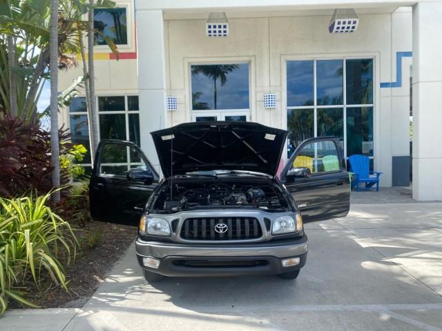 2002 Black Sand Pearl /Charcoal Toyota Tacoma 1 OWNER AUTO AC 4 CYL (5TENL42N02Z) with an 2.4L DOHC EFI 16-Valve I4 Engine engine, Automatic transmission, located at 4701 North Dixie Hwy, Pompano Beach, FL, 33064, (954) 422-2889, 26.240938, -80.123474 - OUR WEBPAGE FLORIDACARS1.COM HAS OVER 100 PHOTOS AND FREE CARFAX LINK 2002 TOYOTA TACOMA VIN: 5TENL42N02Z111289 5 T E N L 4 2 N 0 2 Z 1 1 1 2 8 9 PICKUP 2.4L I4 F DOHC GASOLINE 29 MPG REAR WHEEL DRIVE Features Air Conditioning AM/FM Stereo Automatic Transmission Bed Liner Cassette Player Cloth Seats - Photo#16