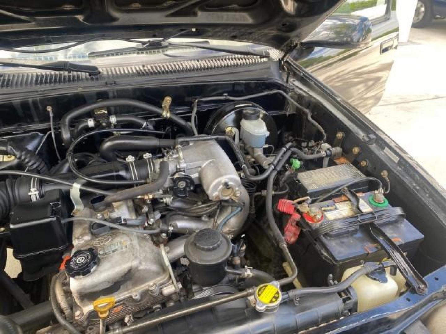 2002 Black Sand Pearl /Charcoal Toyota Tacoma 1 OWNER AUTO AC 4 CYL (5TENL42N02Z) with an 2.4L DOHC EFI 16-Valve I4 Engine engine, Automatic transmission, located at 4701 North Dixie Hwy, Pompano Beach, FL, 33064, (954) 422-2889, 26.240938, -80.123474 - OUR WEBPAGE FLORIDACARS1.COM HAS OVER 100 PHOTOS AND FREE CARFAX LINK 2002 TOYOTA TACOMA VIN: 5TENL42N02Z111289 5 T E N L 4 2 N 0 2 Z 1 1 1 2 8 9 PICKUP 2.4L I4 F DOHC GASOLINE 29 MPG REAR WHEEL DRIVE Features Air Conditioning AM/FM Stereo Automatic Transmission Bed Liner Cassette Player Cloth Seats - Photo#26