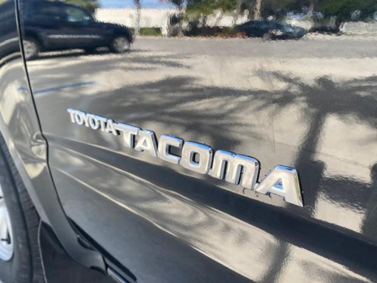 2002 Black Sand Pearl /Charcoal Toyota Tacoma 1 OWNER AUTO AC 4 CYL (5TENL42N02Z) with an 2.4L DOHC EFI 16-Valve I4 Engine engine, Automatic transmission, located at 4701 North Dixie Hwy, Pompano Beach, FL, 33064, (954) 422-2889, 26.240938, -80.123474 - OUR WEBPAGE FLORIDACARS1.COM HAS OVER 100 PHOTOS AND FREE CARFAX LINK 2002 TOYOTA TACOMA VIN: 5TENL42N02Z111289 5 T E N L 4 2 N 0 2 Z 1 1 1 2 8 9 PICKUP 2.4L I4 F DOHC GASOLINE 29 MPG REAR WHEEL DRIVE Features Air Conditioning AM/FM Stereo Automatic Transmission Bed Liner Cassette Player Cloth Seats - Photo#41