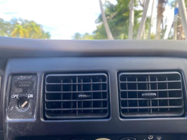 2002 Black Sand Pearl /Charcoal Toyota Tacoma 1 OWNER AUTO AC 4 CYL (5TENL42N02Z) with an 2.4L DOHC EFI 16-Valve I4 Engine engine, Automatic transmission, located at 4701 North Dixie Hwy, Pompano Beach, FL, 33064, (954) 422-2889, 26.240938, -80.123474 - OUR WEBPAGE FLORIDACARS1.COM HAS OVER 100 PHOTOS AND FREE CARFAX LINK 2002 TOYOTA TACOMA VIN: 5TENL42N02Z111289 5 T E N L 4 2 N 0 2 Z 1 1 1 2 8 9 PICKUP 2.4L I4 F DOHC GASOLINE 29 MPG REAR WHEEL DRIVE Features Air Conditioning AM/FM Stereo Automatic Transmission Bed Liner Cassette Player Cloth Seats - Photo#57