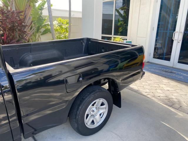 2002 Black Sand Pearl /Charcoal Toyota Tacoma 1 OWNER AUTO AC 4 CYL (5TENL42N02Z) with an 2.4L DOHC EFI 16-Valve I4 Engine engine, Automatic transmission, located at 4701 North Dixie Hwy, Pompano Beach, FL, 33064, (954) 422-2889, 26.240938, -80.123474 - OUR WEBPAGE FLORIDACARS1.COM HAS OVER 100 PHOTOS AND FREE CARFAX LINK 2002 TOYOTA TACOMA VIN: 5TENL42N02Z111289 5 T E N L 4 2 N 0 2 Z 1 1 1 2 8 9 PICKUP 2.4L I4 F DOHC GASOLINE 29 MPG REAR WHEEL DRIVE Features Air Conditioning AM/FM Stereo Automatic Transmission Bed Liner Cassette Player Cloth Seats - Photo#73