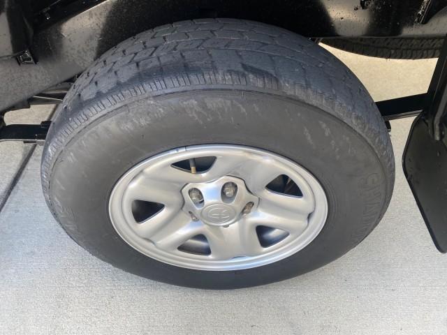 2002 Black Sand Pearl /Charcoal Toyota Tacoma 1 OWNER AUTO AC 4 CYL (5TENL42N02Z) with an 2.4L DOHC EFI 16-Valve I4 Engine engine, Automatic transmission, located at 4701 North Dixie Hwy, Pompano Beach, FL, 33064, (954) 422-2889, 26.240938, -80.123474 - OUR WEBPAGE FLORIDACARS1.COM HAS OVER 100 PHOTOS AND FREE CARFAX LINK 2002 TOYOTA TACOMA VIN: 5TENL42N02Z111289 5 T E N L 4 2 N 0 2 Z 1 1 1 2 8 9 PICKUP 2.4L I4 F DOHC GASOLINE 29 MPG REAR WHEEL DRIVE Features Air Conditioning AM/FM Stereo Automatic Transmission Bed Liner Cassette Player Cloth Seats - Photo#82