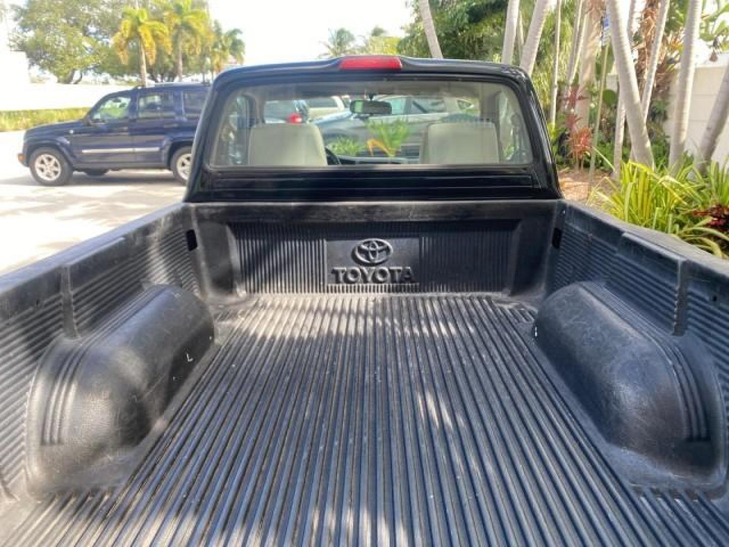 2002 Black Sand Pearl /Charcoal Toyota Tacoma 1 OWNER AUTO AC 4 CYL (5TENL42N02Z) with an 2.4L DOHC EFI 16-Valve I4 Engine engine, Automatic transmission, located at 4701 North Dixie Hwy, Pompano Beach, FL, 33064, (954) 422-2889, 26.240938, -80.123474 - OUR WEBPAGE FLORIDACARS1.COM HAS OVER 100 PHOTOS AND FREE CARFAX LINK 2002 TOYOTA TACOMA VIN: 5TENL42N02Z111289 5 T E N L 4 2 N 0 2 Z 1 1 1 2 8 9 PICKUP 2.4L I4 F DOHC GASOLINE 29 MPG REAR WHEEL DRIVE Features Air Conditioning AM/FM Stereo Automatic Transmission Bed Liner Cassette Player Cloth Seats - Photo#85